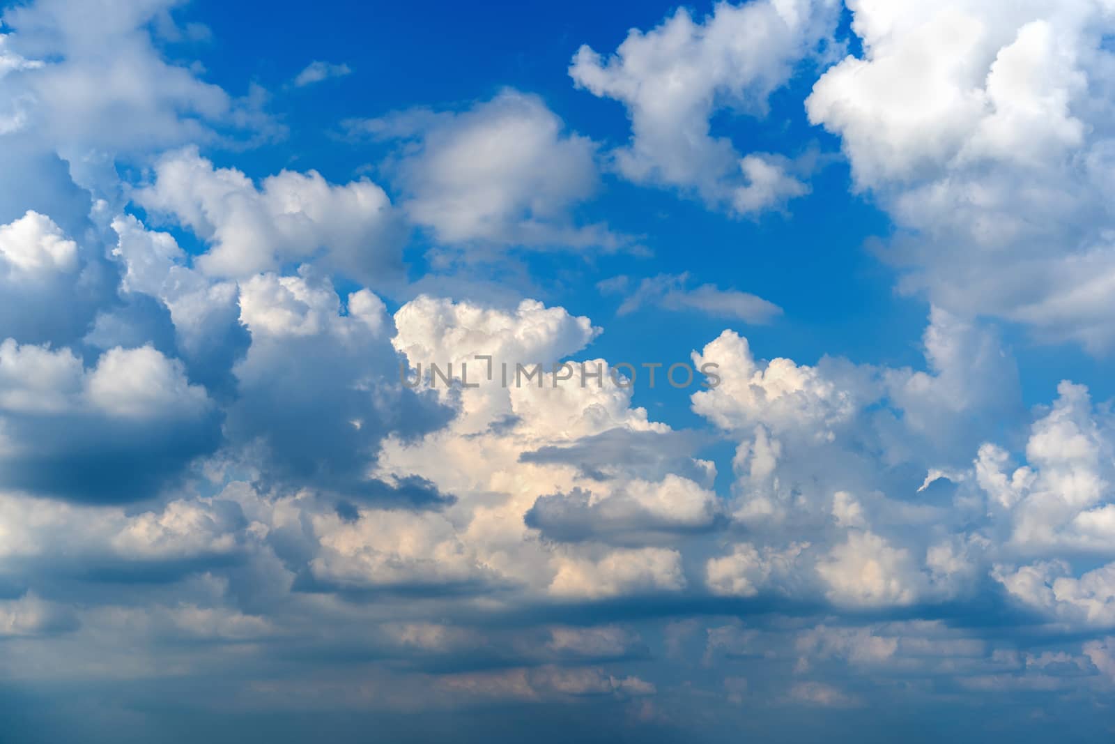 Blue sky with white clouds. Sky background.