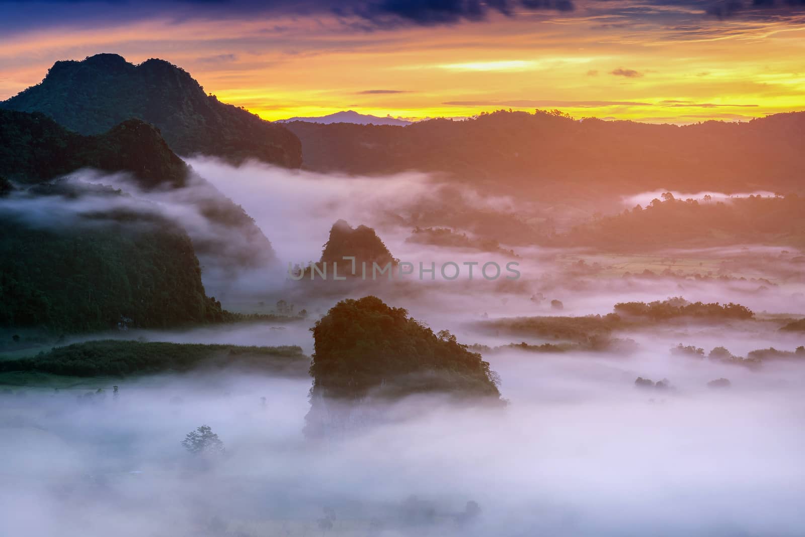 Sunrise on the morning mist at Phu Lang Ka, Phayao in Thailand. by gutarphotoghaphy