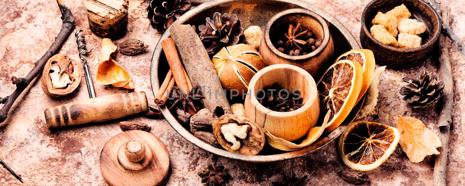 Ingredients for mulled wine on a rustic background.Winter drink mulled wine