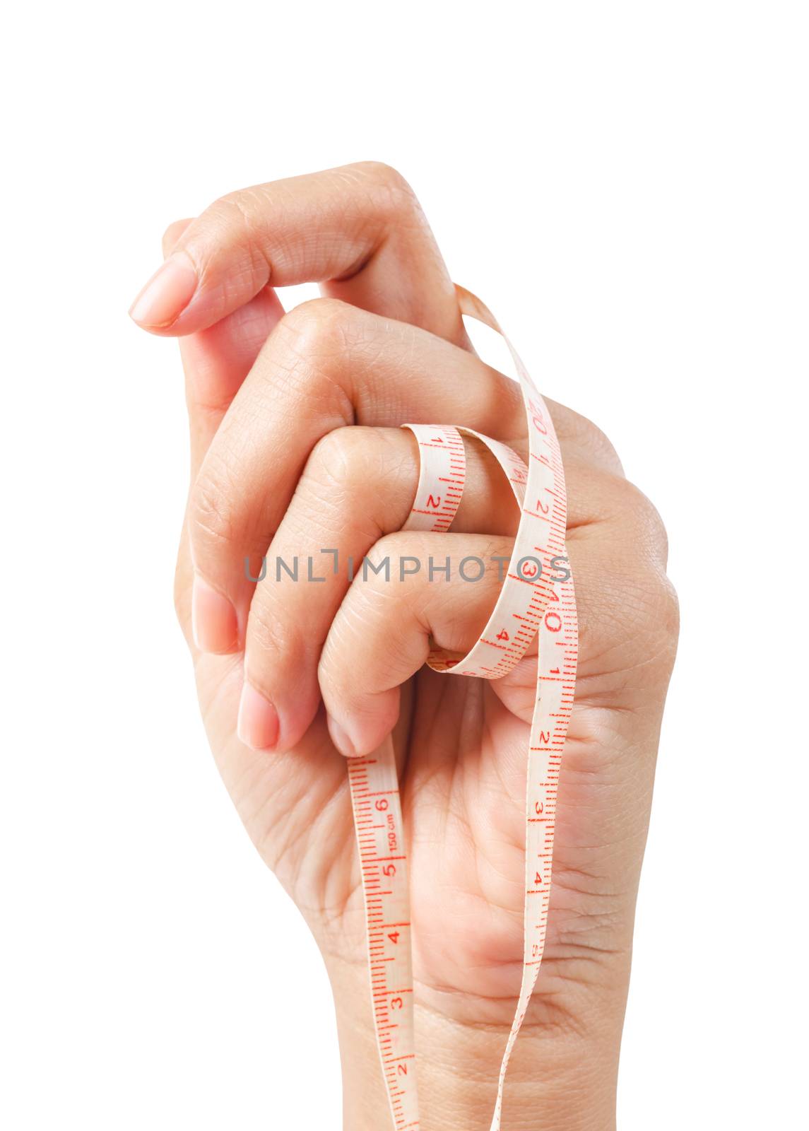 Woman hand holding measuring tape isolated on white background. by Gamjai