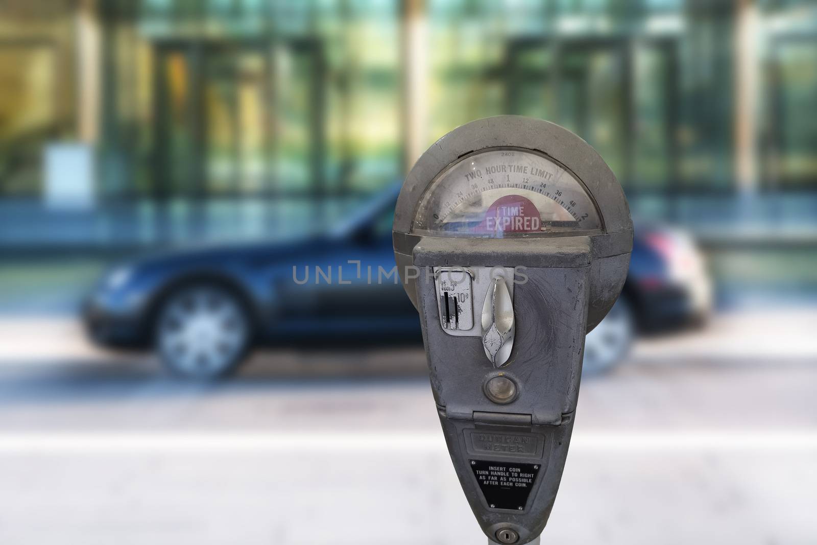 Retro parking meter with time isolated on white background.