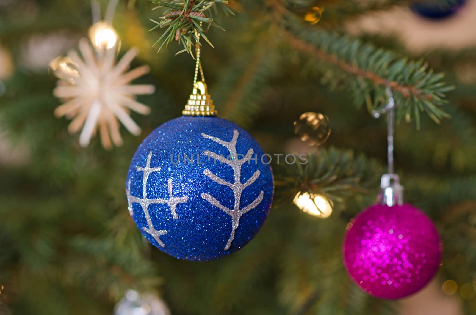 Decorations of christmas three, with mythological characters. Christmas-tree colored balls to decorate the Christmas tree.