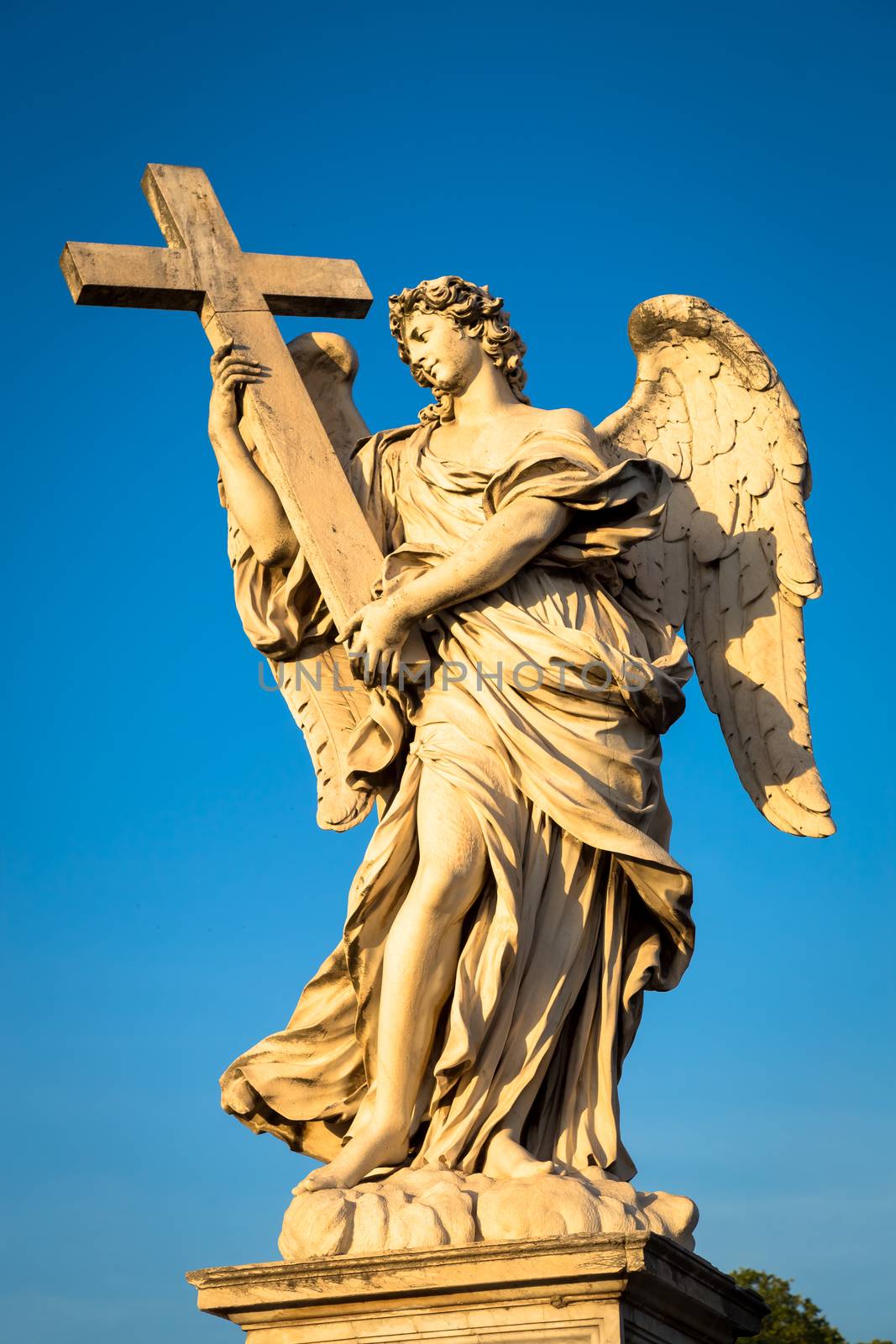 Rome, statue of an angel on the bridge in front of Castel Sant'Angelo. Conceptual useful for spirituality, christianity and faith.