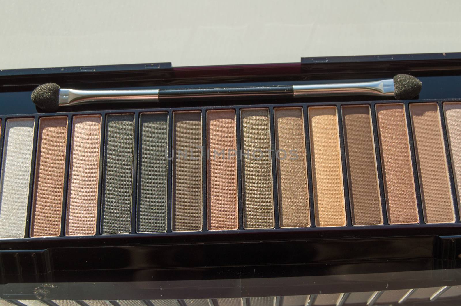 Cosmetic palette with brush and eye shadow with light brown, beige and Nude eyeshadow by claire_lucia