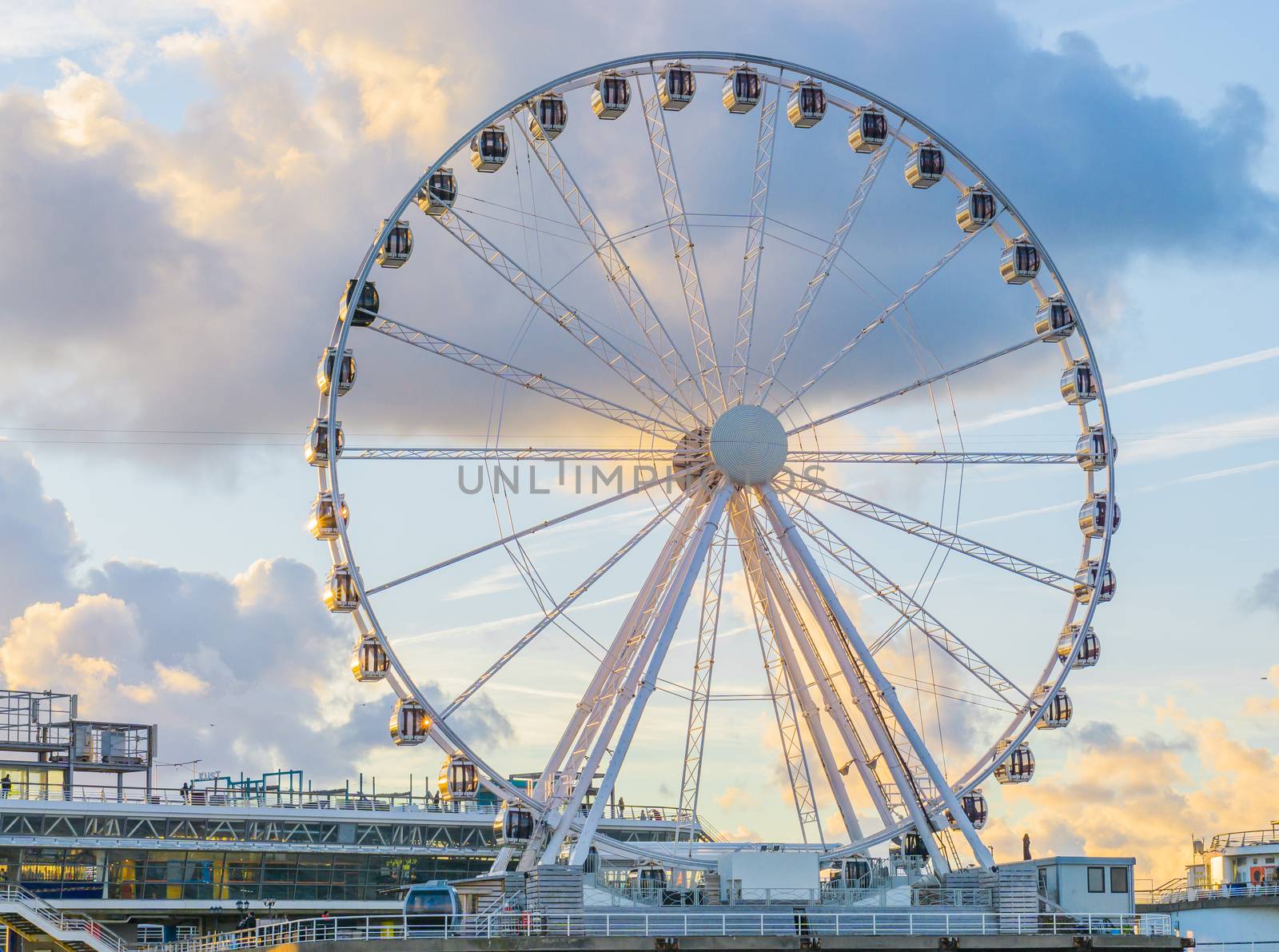 big ferris wheel attraction at the pier of Scheveningen beach Holland a well-known and touristic town