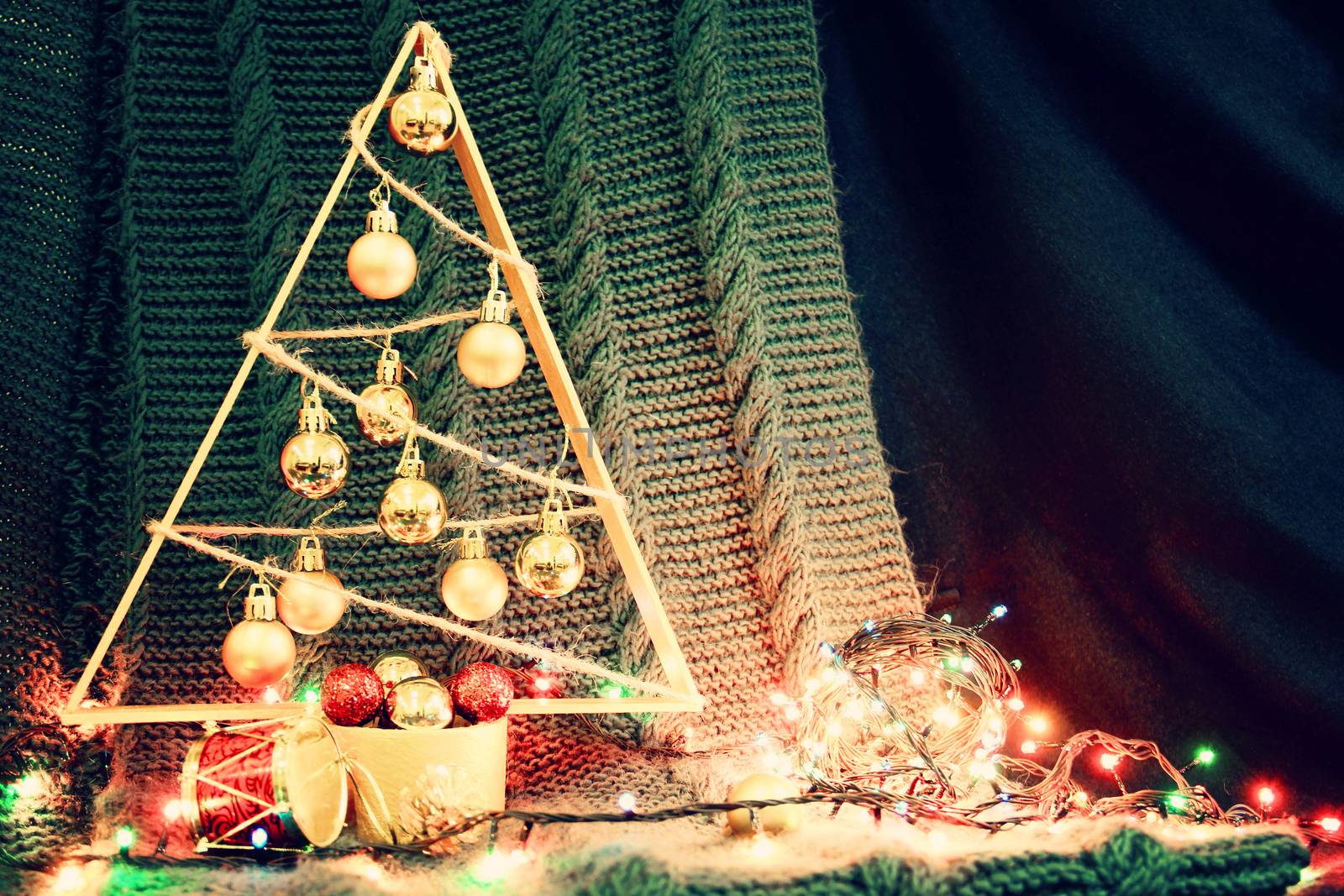 background with christmas tree with garland. photo