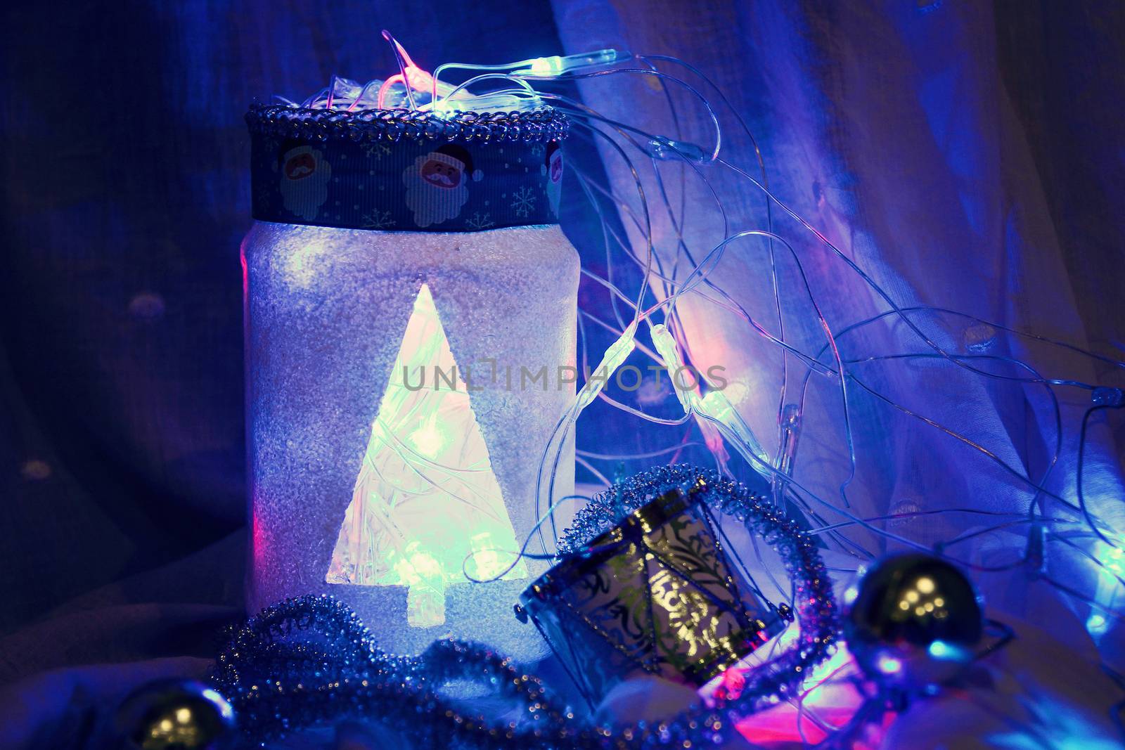 christmas background with handmade white lamp and toys. photo