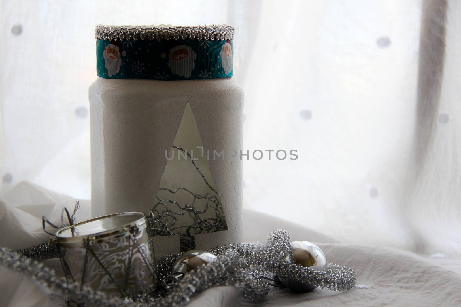 christmas background with handmade lamp with toys. photo by Irinavk