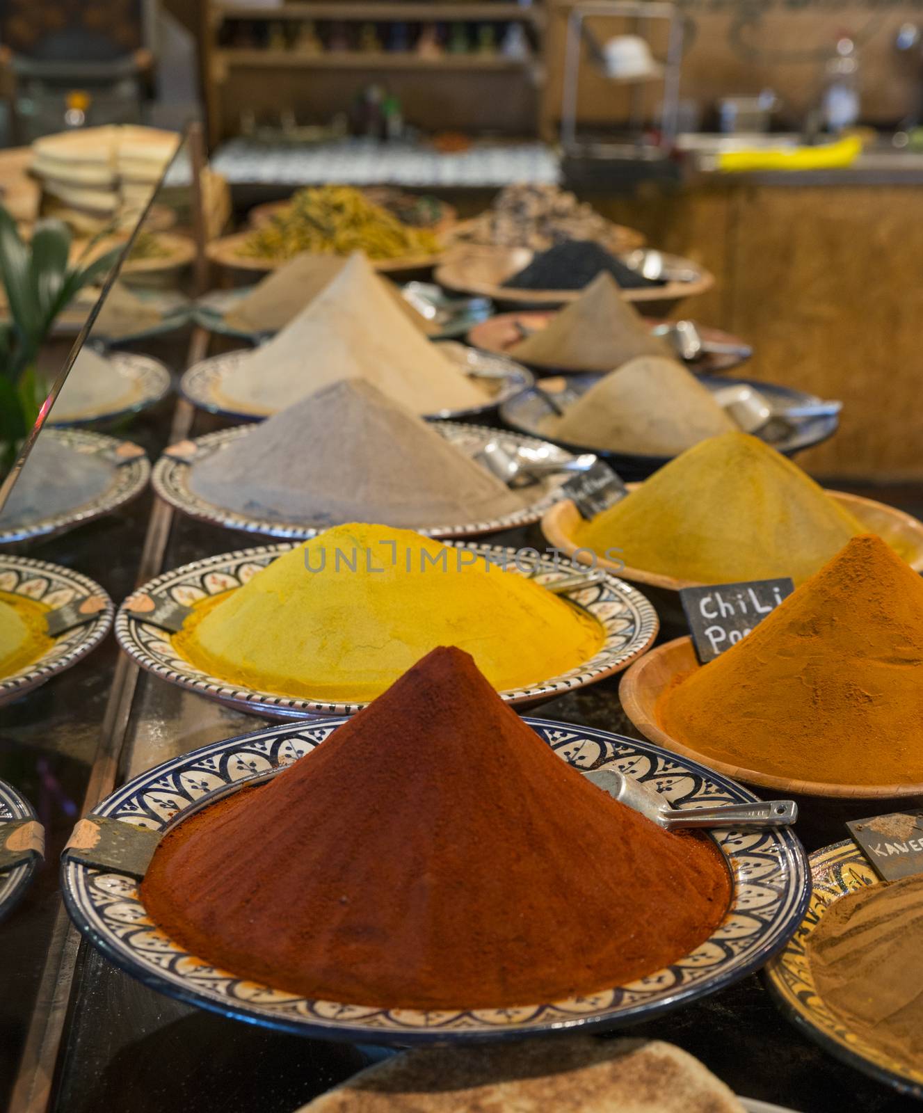 towers of spices in a shop in rotterdam in Holland in a multicultural area