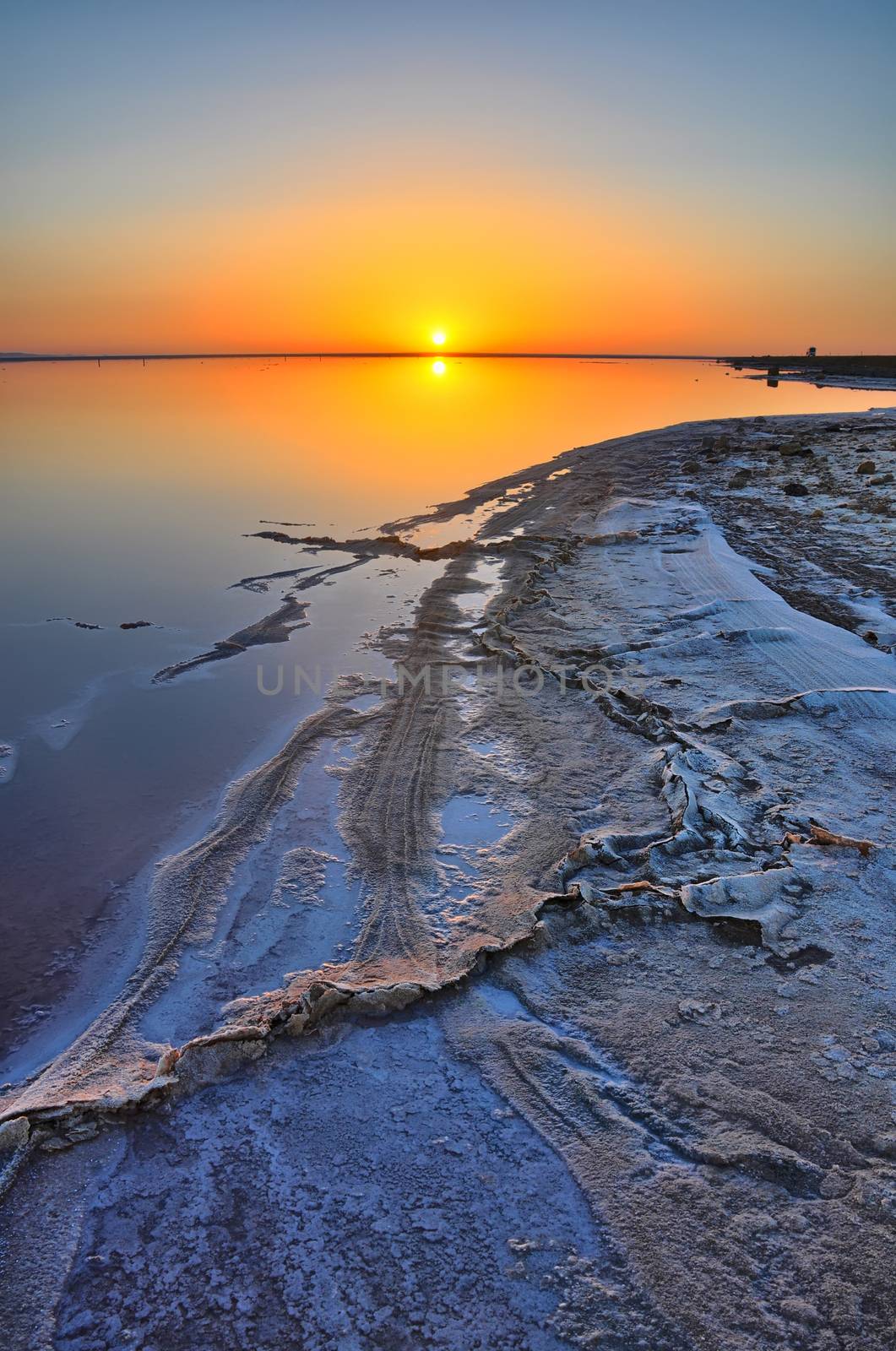 Beautiful sunrise on salt lake Chott el Djerid, Sahara desert, T by Eagle2308