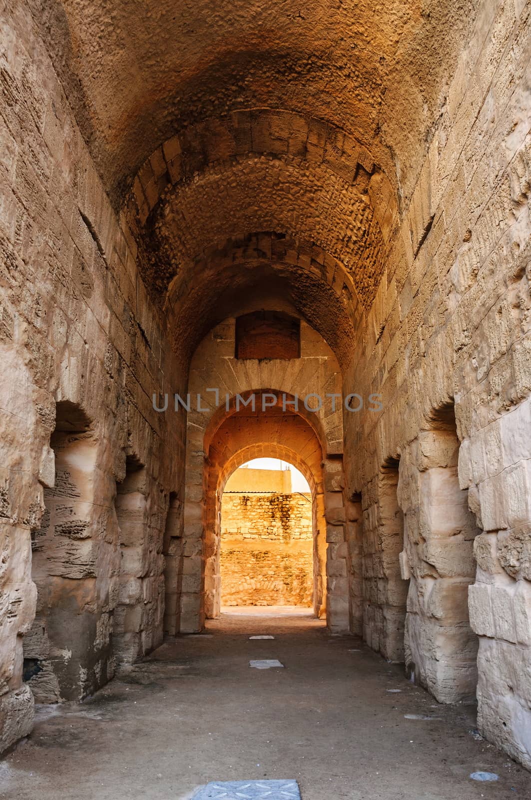 Corridor in ruins of the largest coliseum in North Africa. El Jem,Tunisia, UNESCO.
