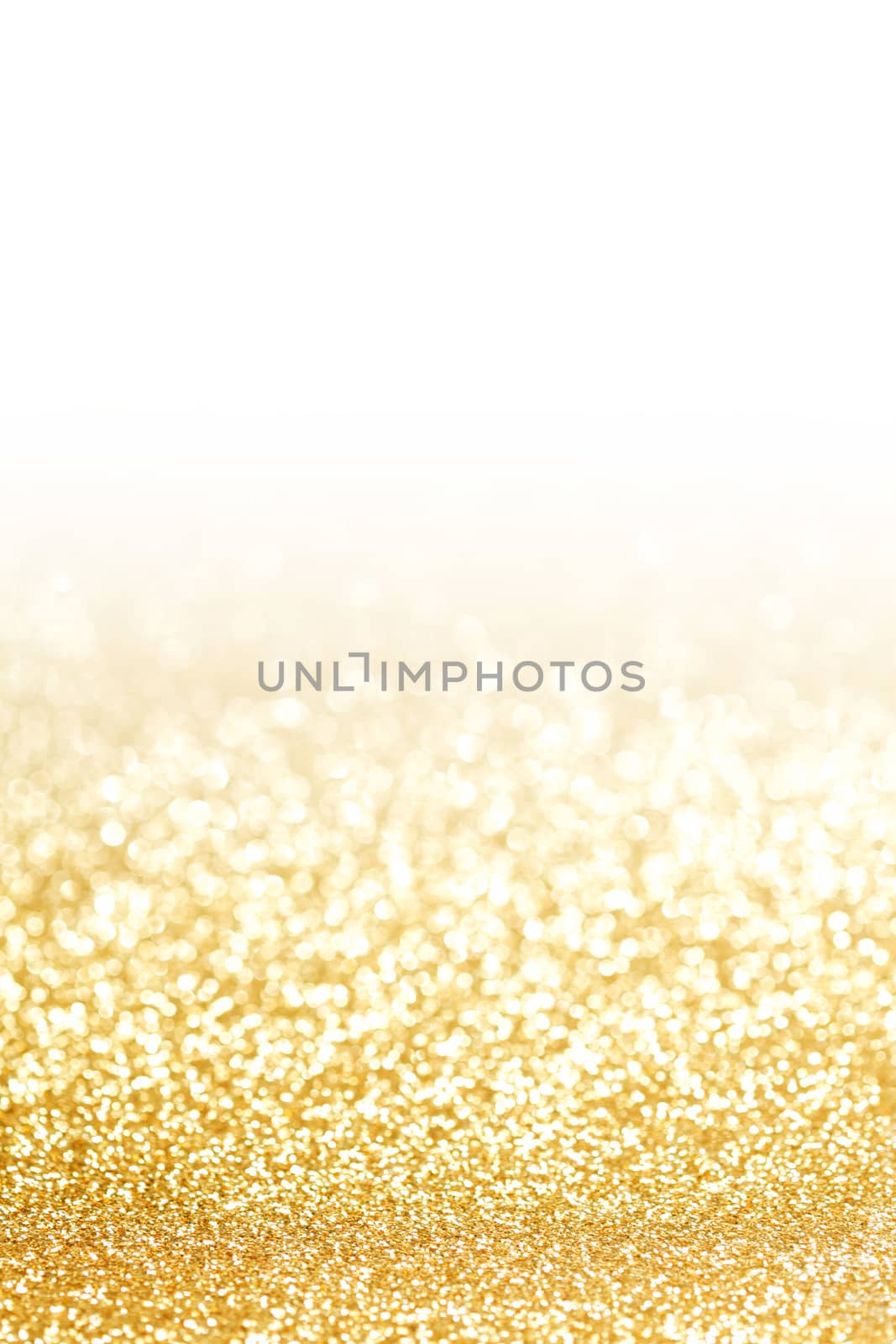 Golden decorative glitters on white background