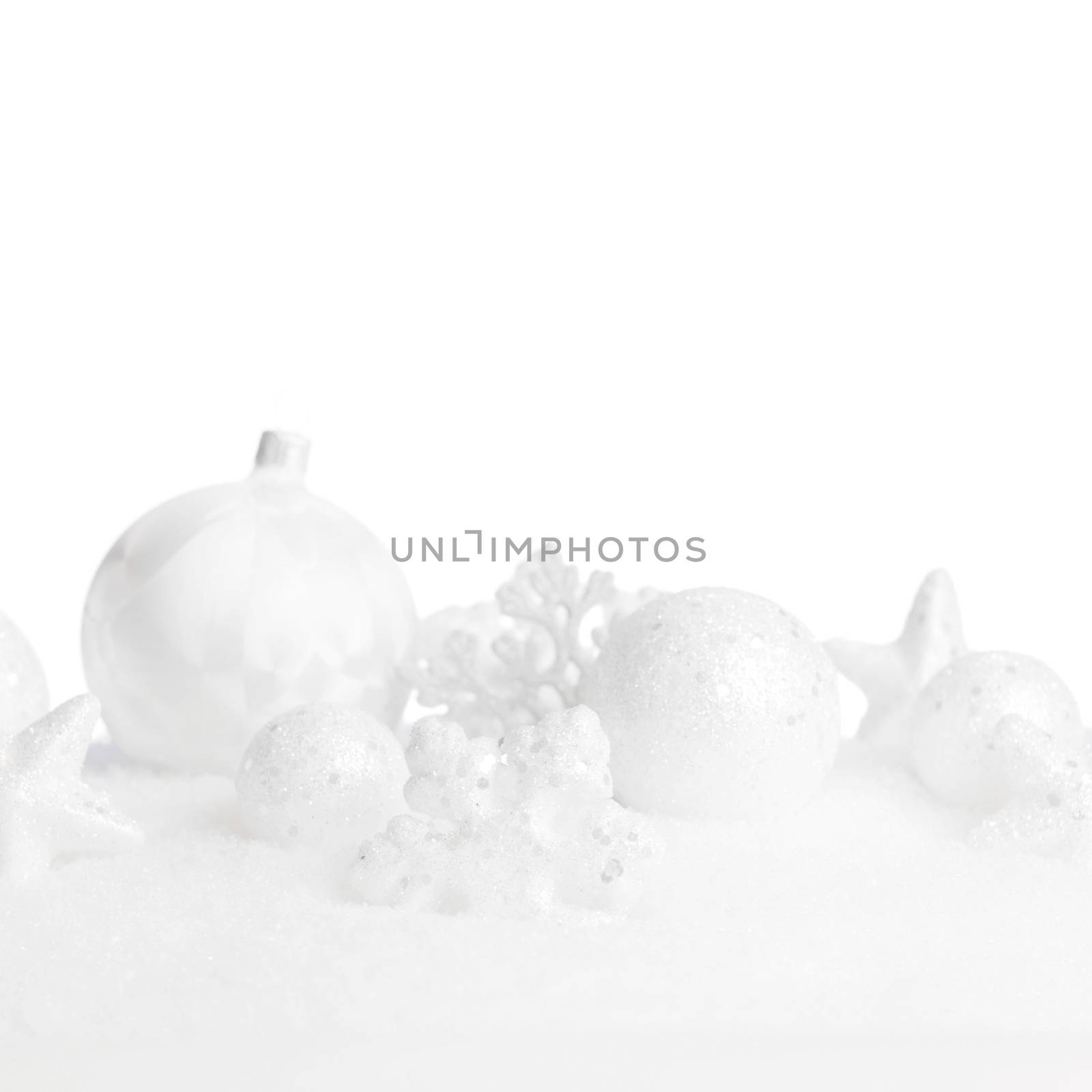 Christmas card with beautiful white decorations in snow