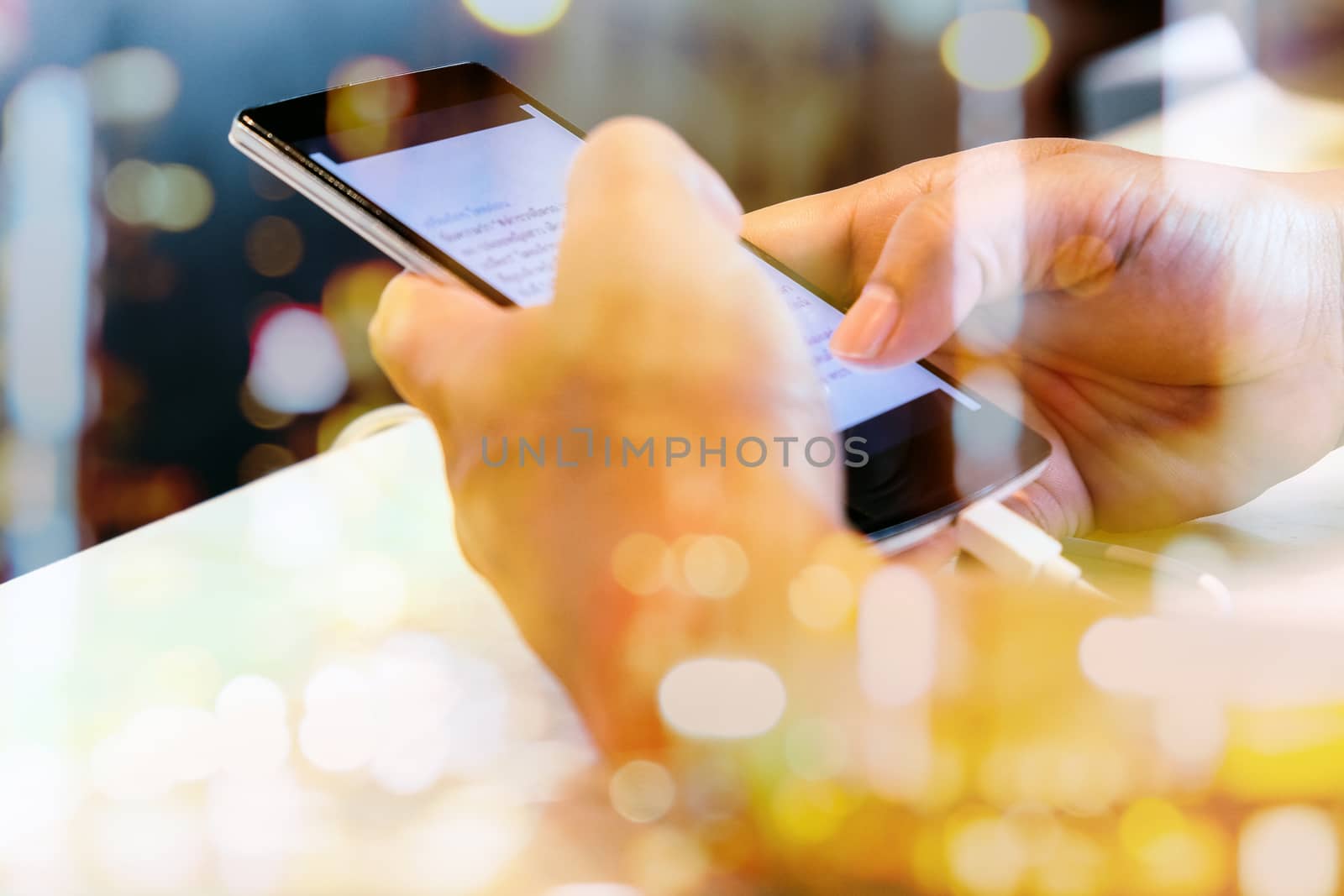 Teenage girl text messaging on her phone