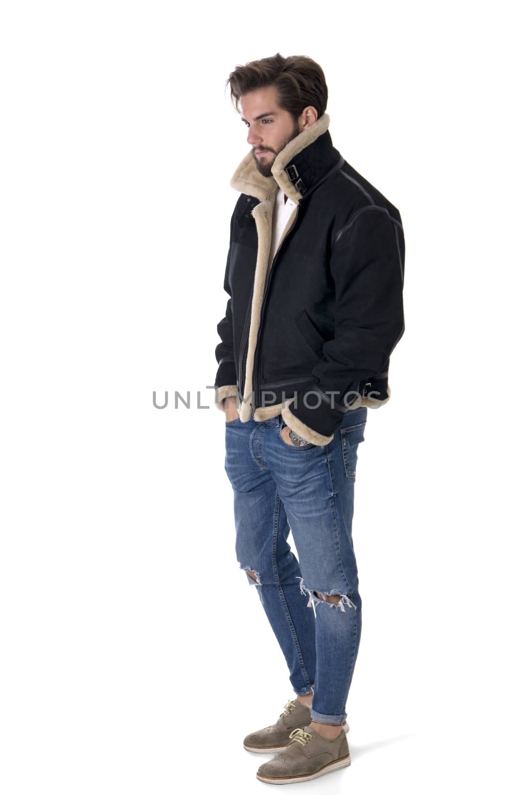 Contemporary stylish man in jacket in studio by artofphoto