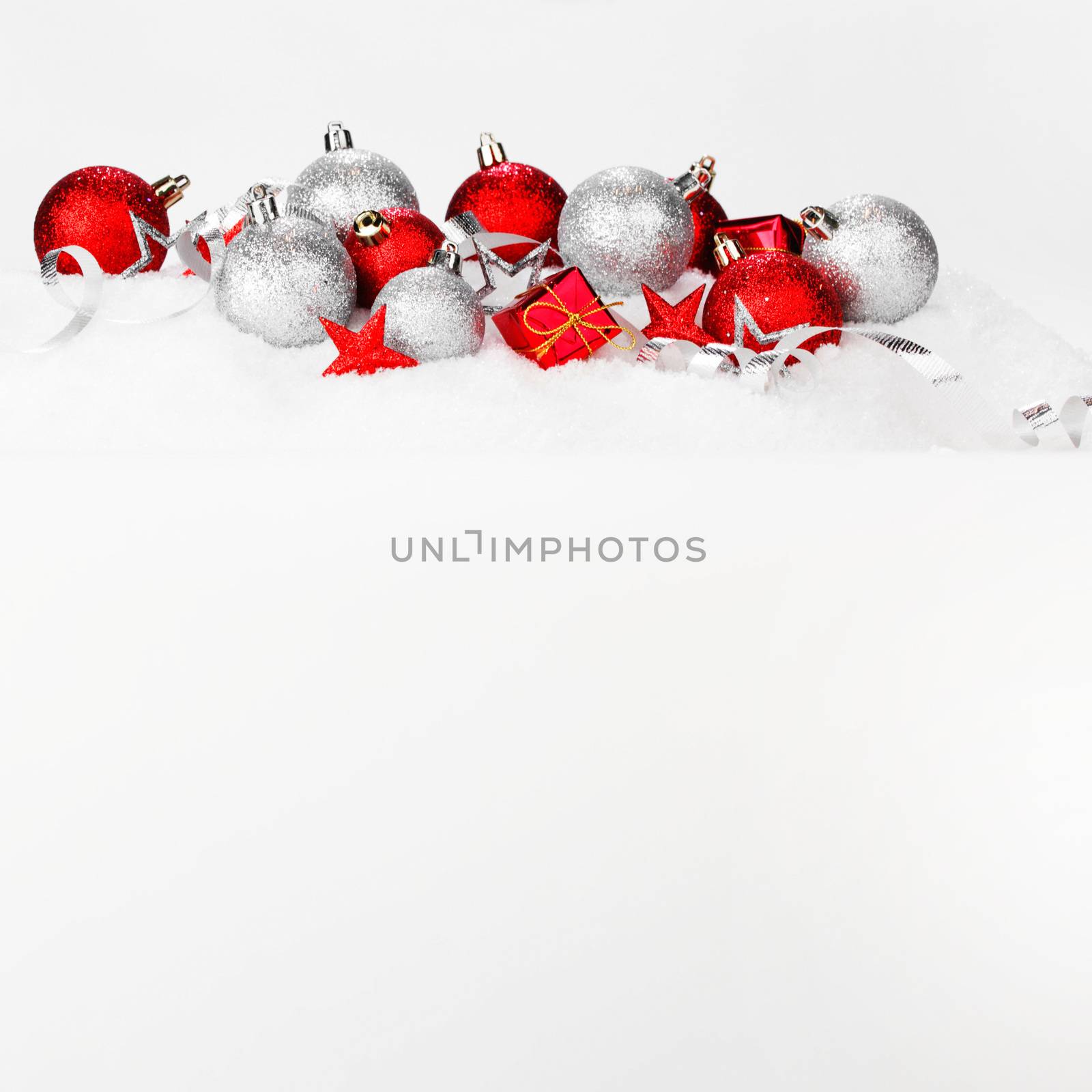 Christmas balls on snow by Yellowj