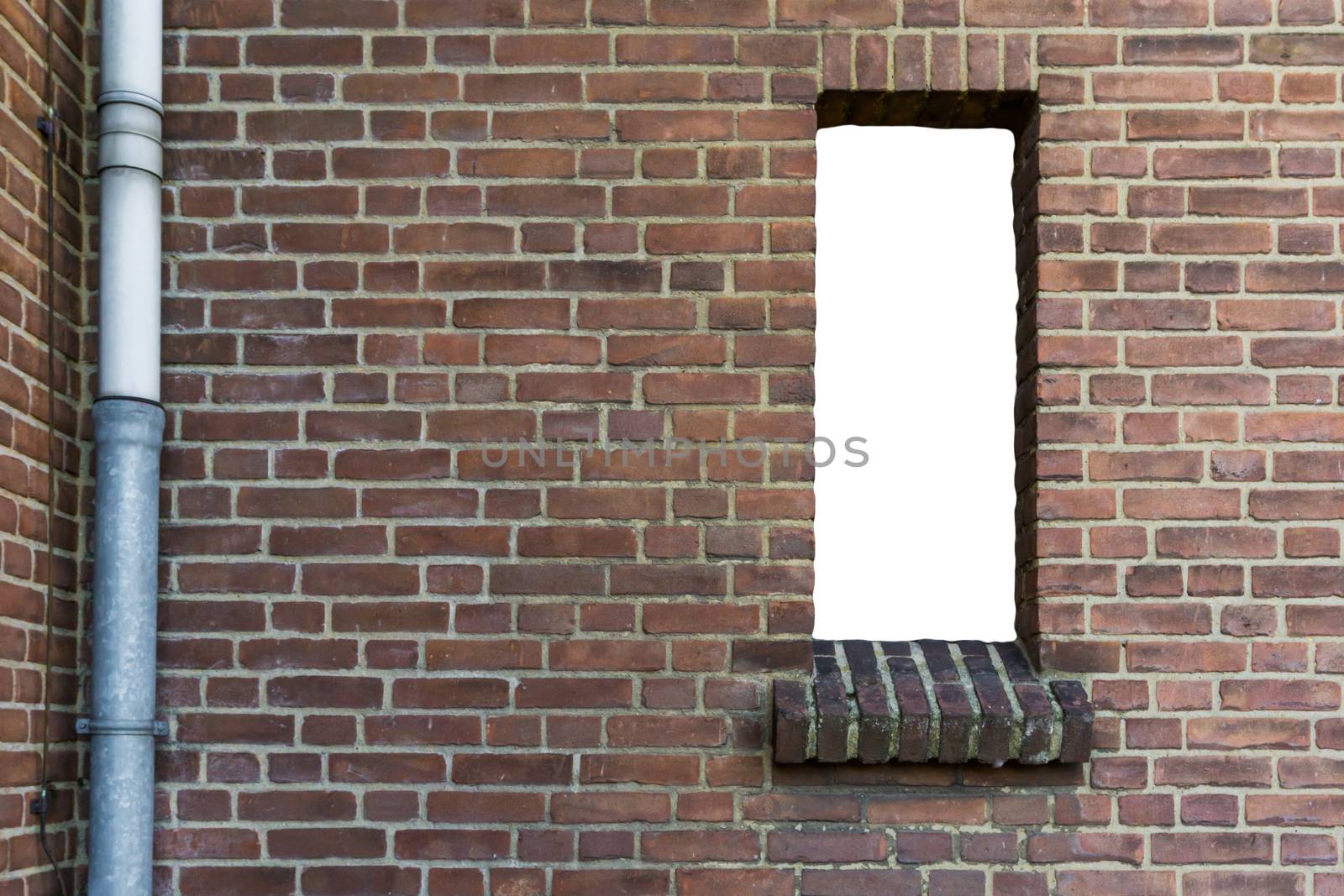 stone brick wall with a cut out open empty window isolated with white texture background by charlottebleijenberg