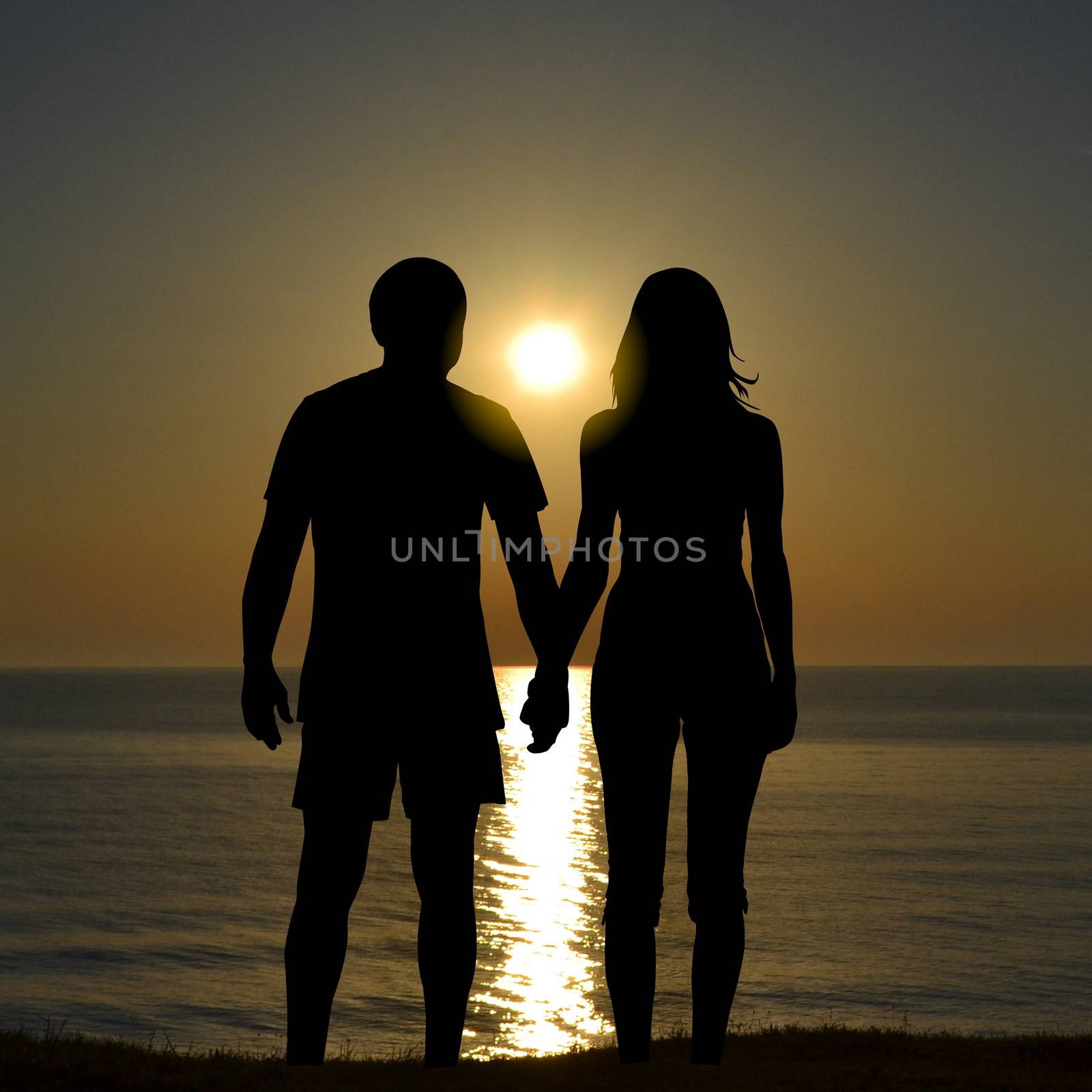 Silhouettes of lovers at sunrise to the shore