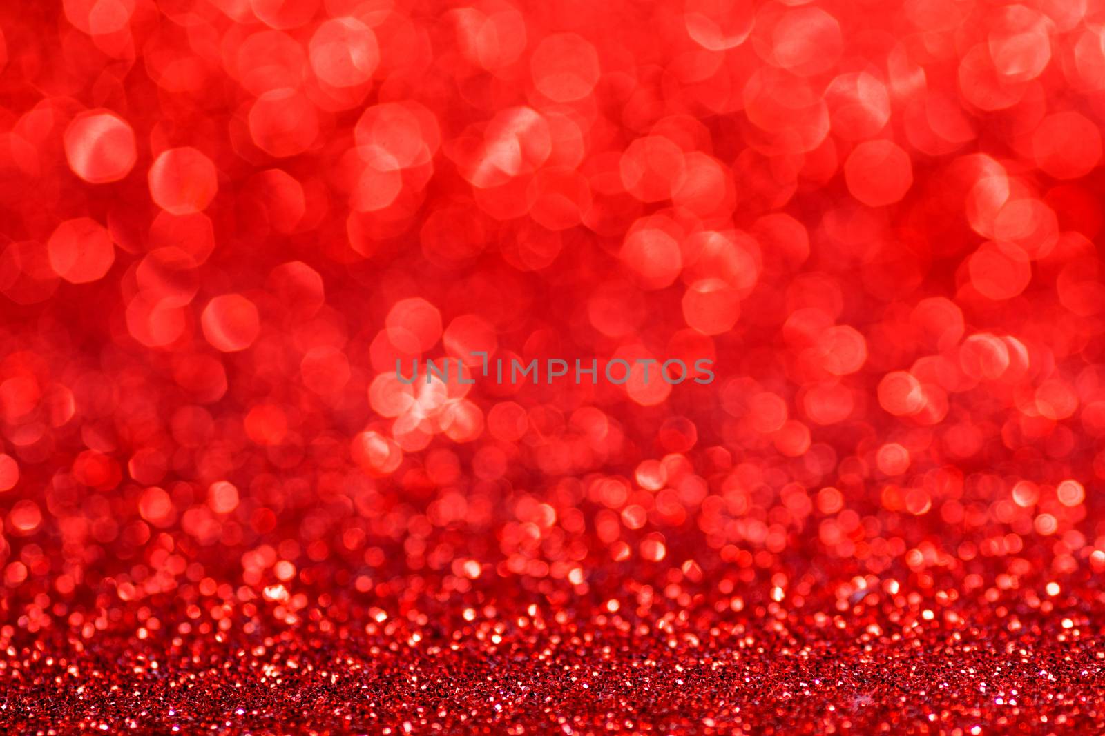Red twinkling lights abstract holiday background with copy space