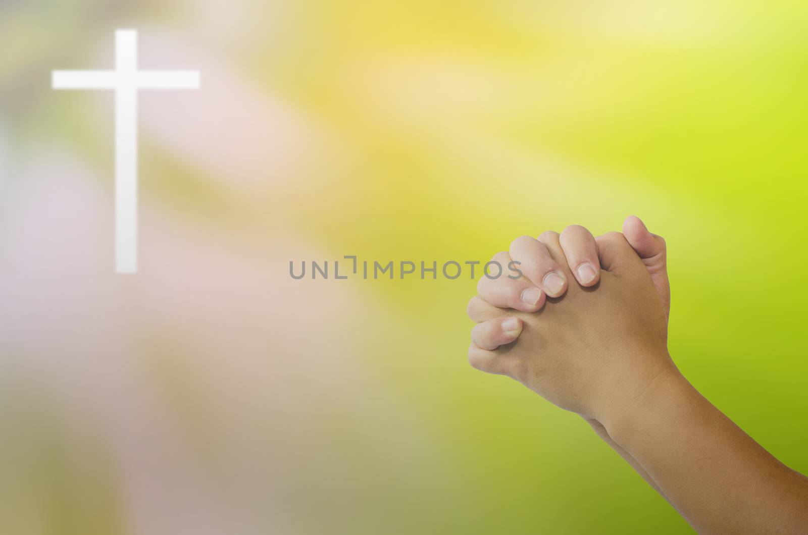 Pray for God's blessing Cross on natural background blurring by photobyphotoboy