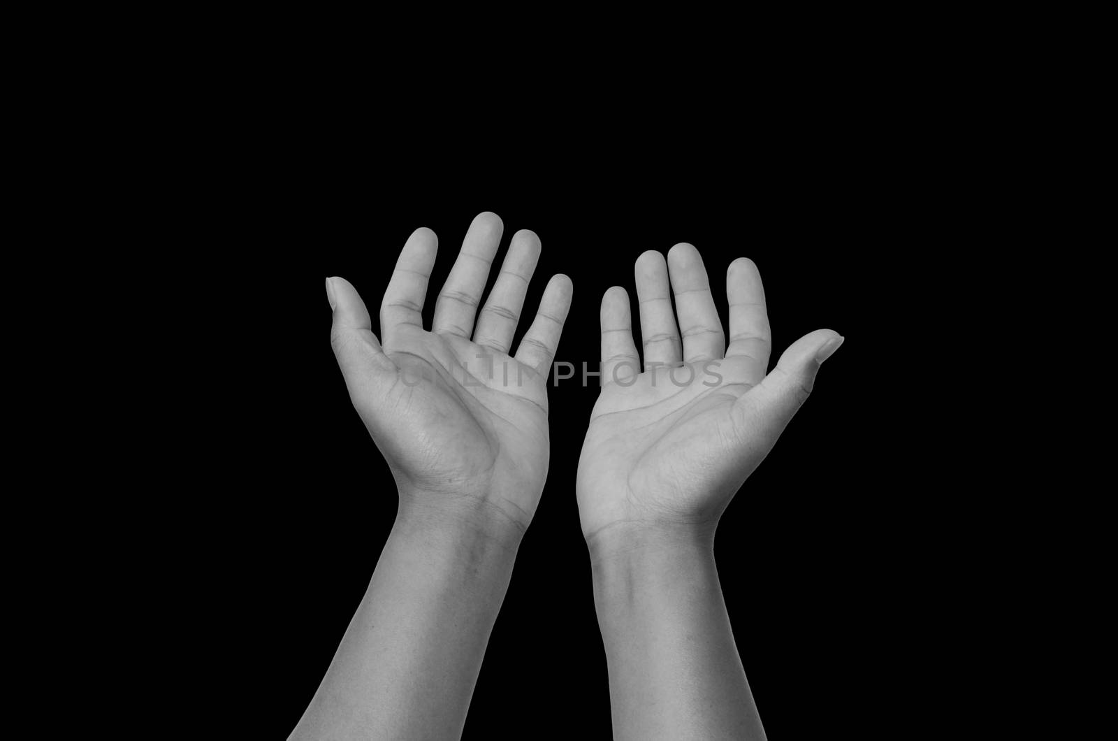 Open hands on black background by photobyphotoboy