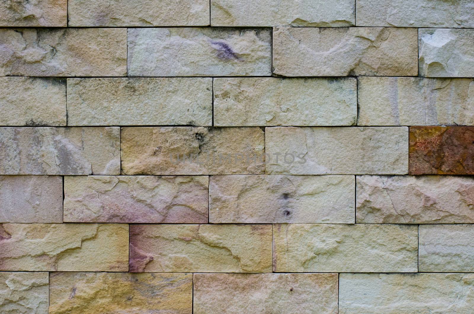 Background of stone wall made with blocks by photobyphotoboy