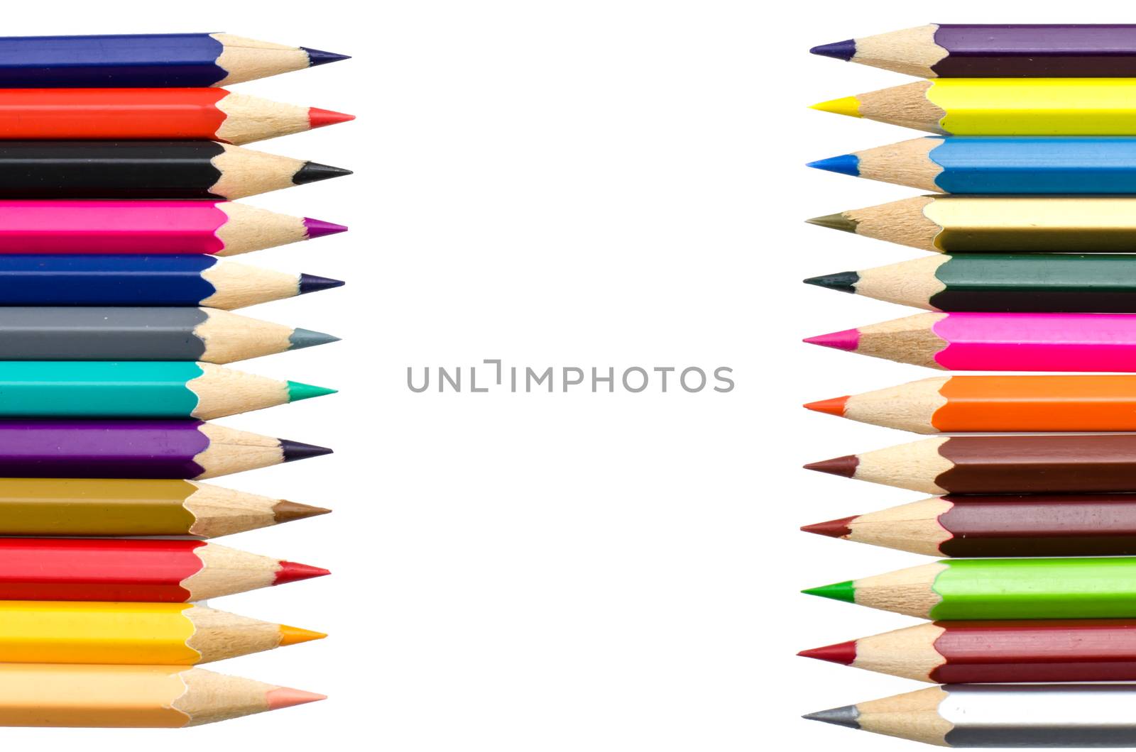 Colour pencils isolated on white background close up by photobyphotoboy