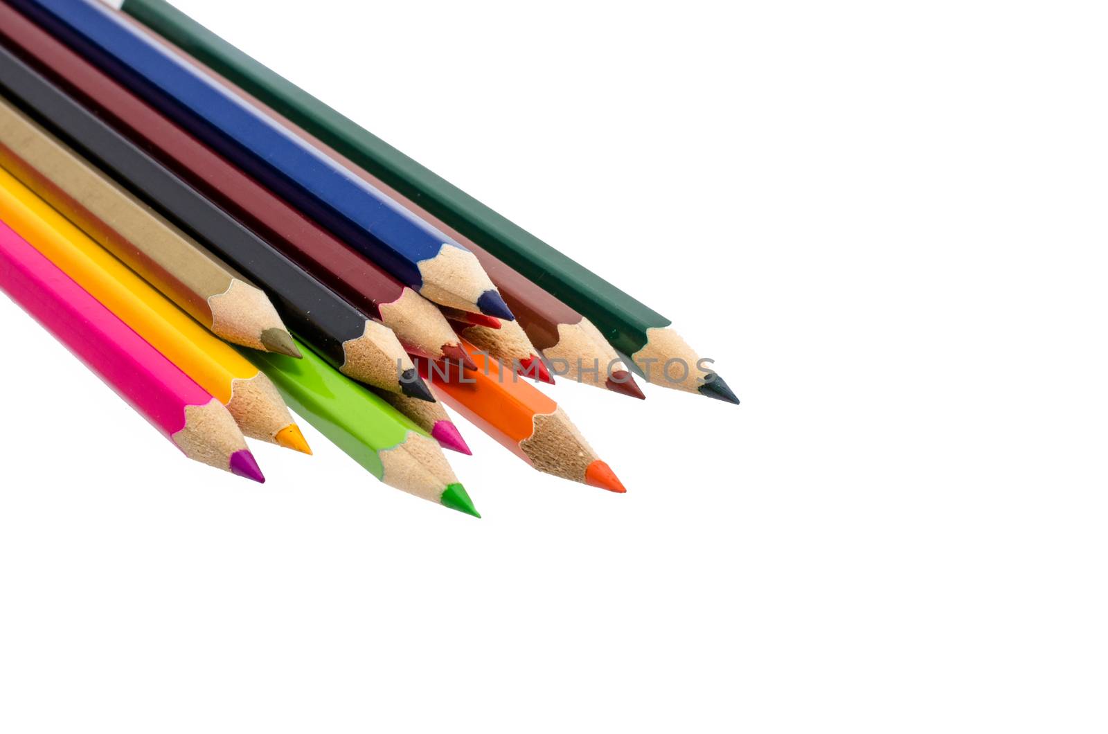 Colour pencils isolated on white background close up by photobyphotoboy