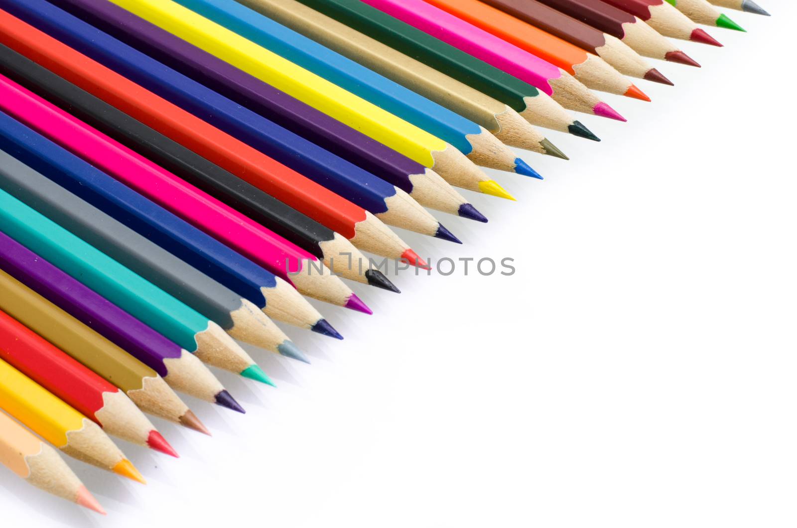 Colour pencils isolated on white background close up