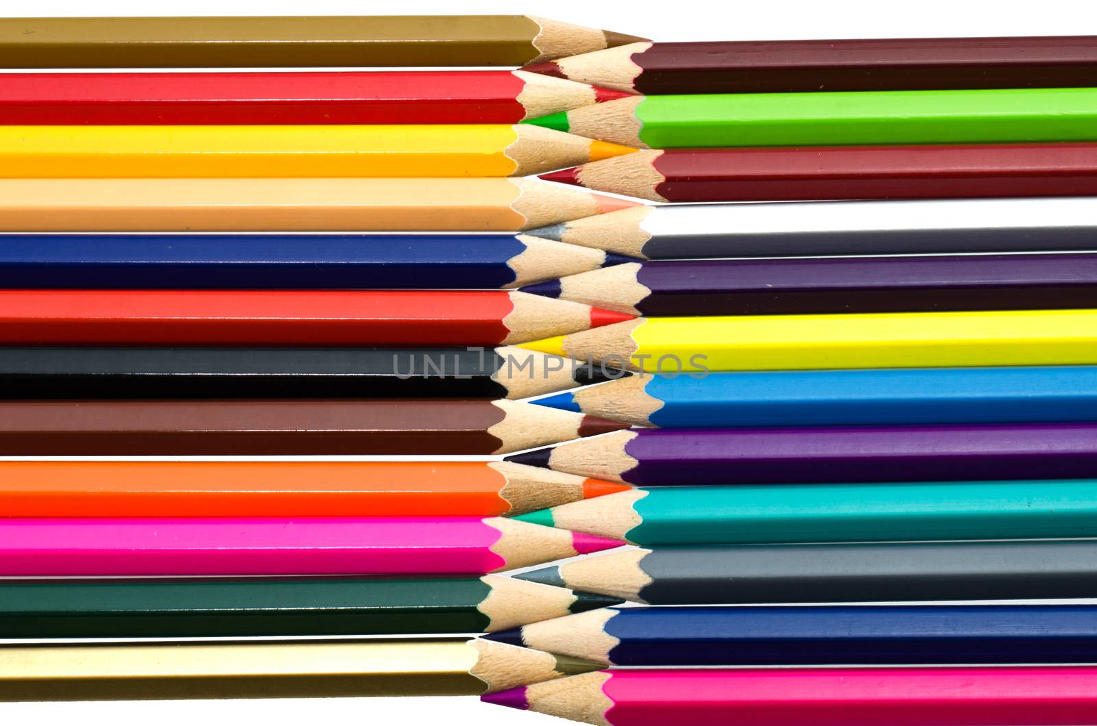 Colour pencils isolated on white background close up by photobyphotoboy