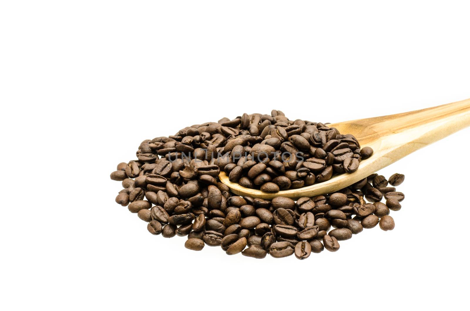 Coffee beans in  wood ladle and scattered, isolated over white background.