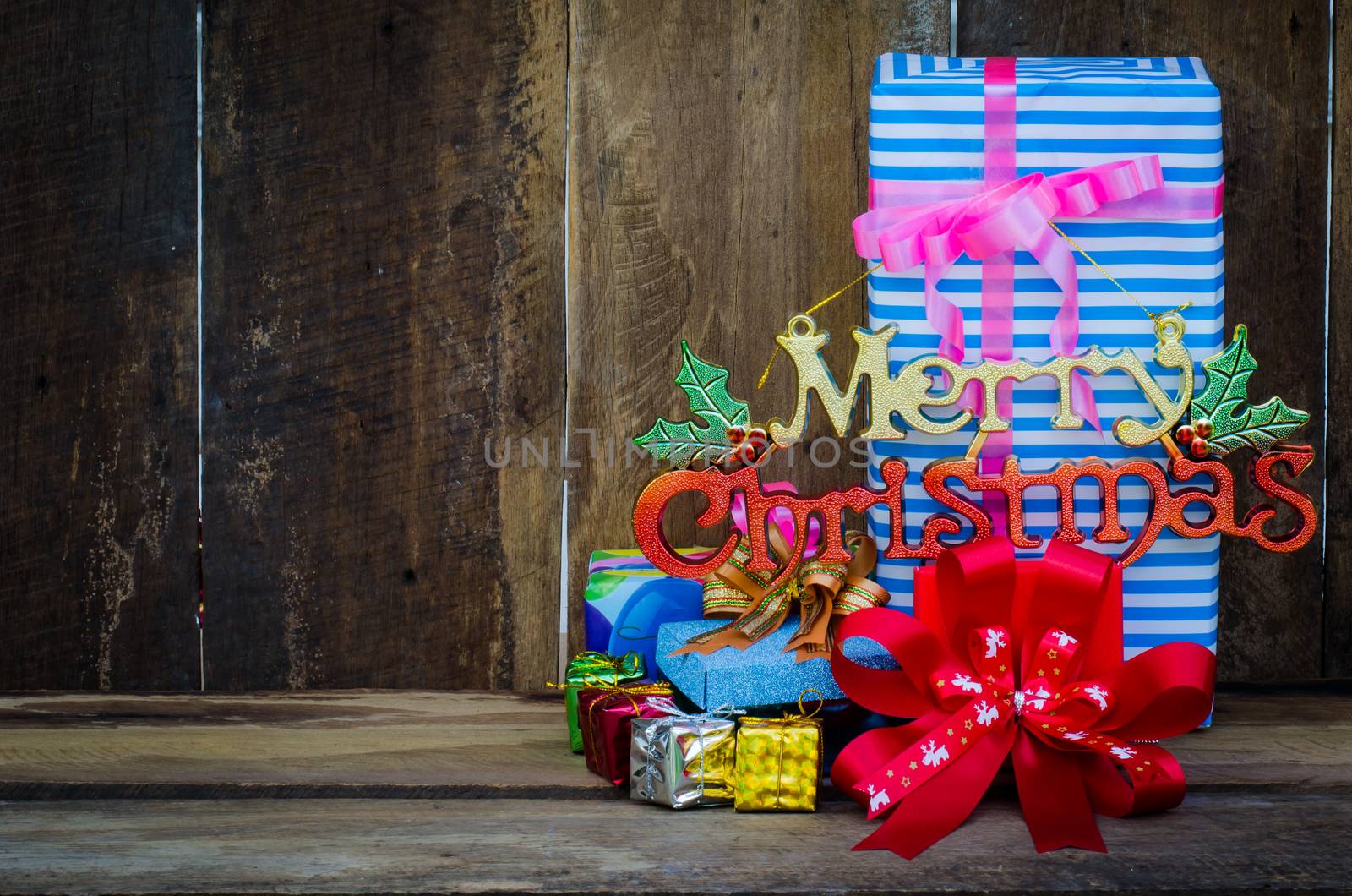 Gift boxes  christmas on wood background by photobyphotoboy
