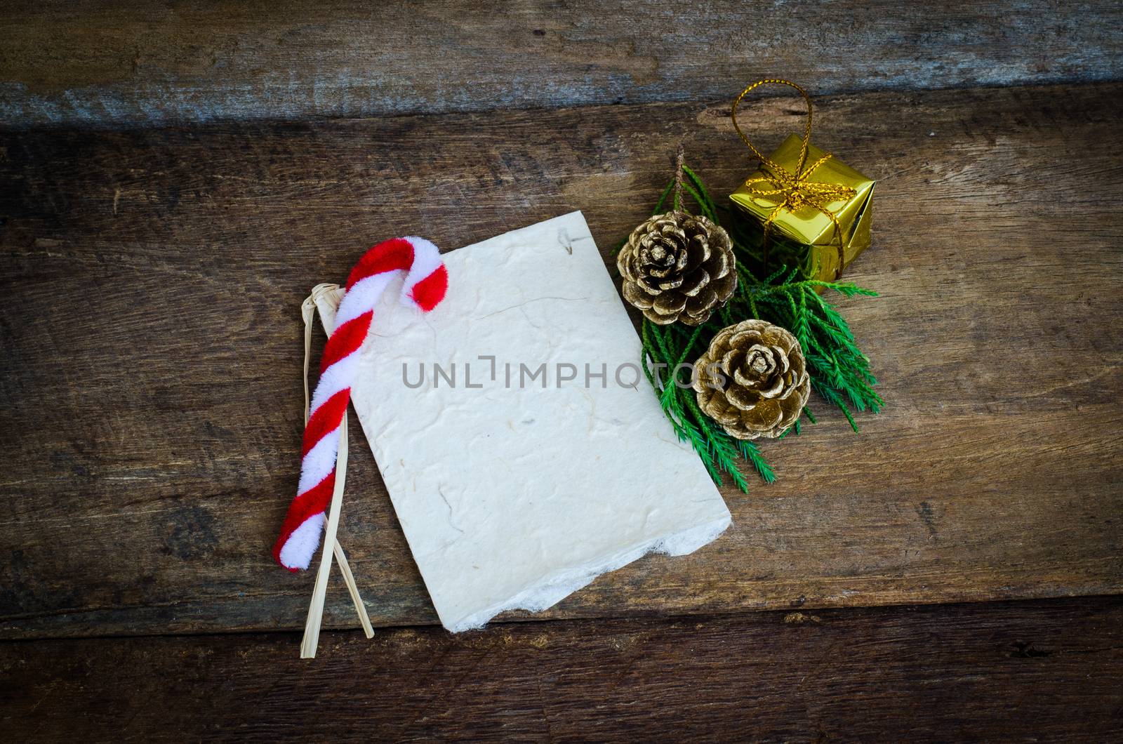 card for Christmas on wood background