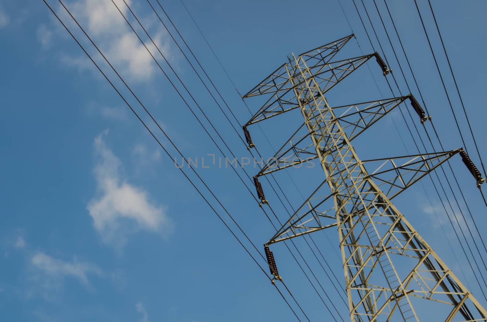 high voltage post.High-voltage tower sky background.