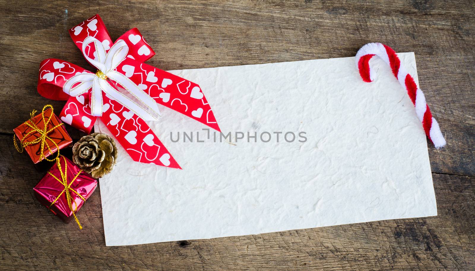card for Christmas on wood background