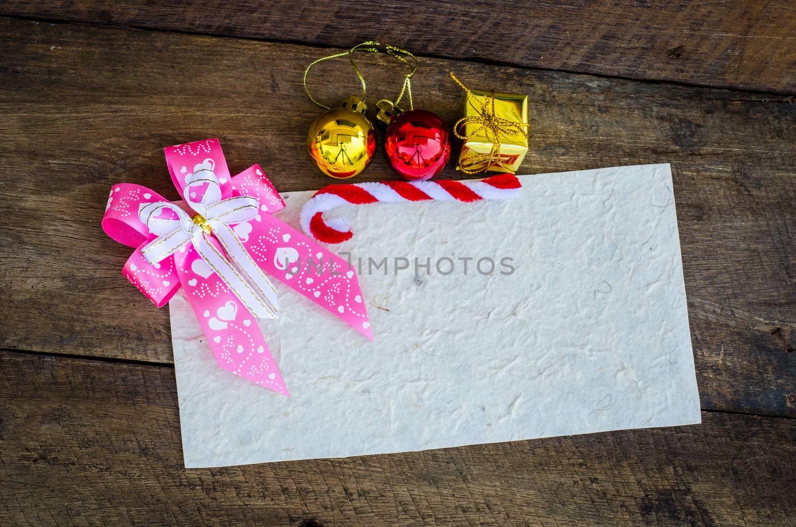 card for Christmas on wood background by photobyphotoboy