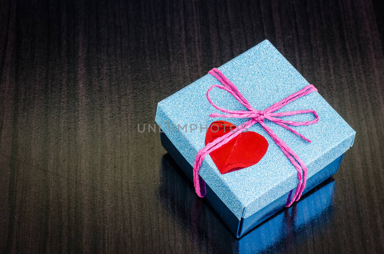 gift box on wooden background.