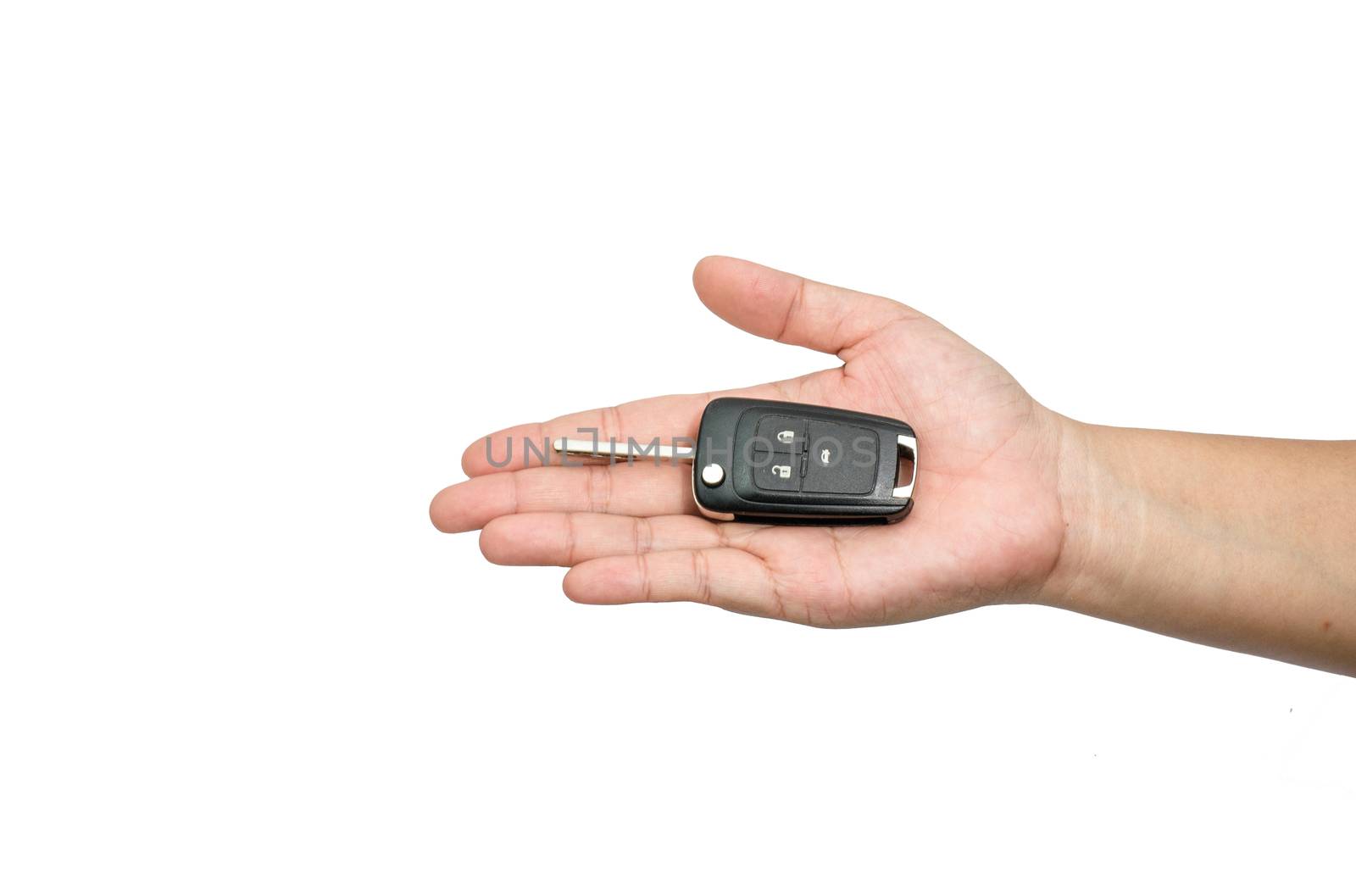hand holding a car key isolated on white background by photobyphotoboy