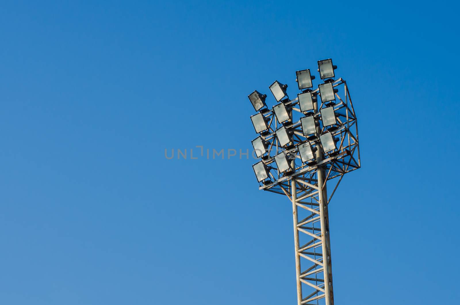 mast with spotlights sky background