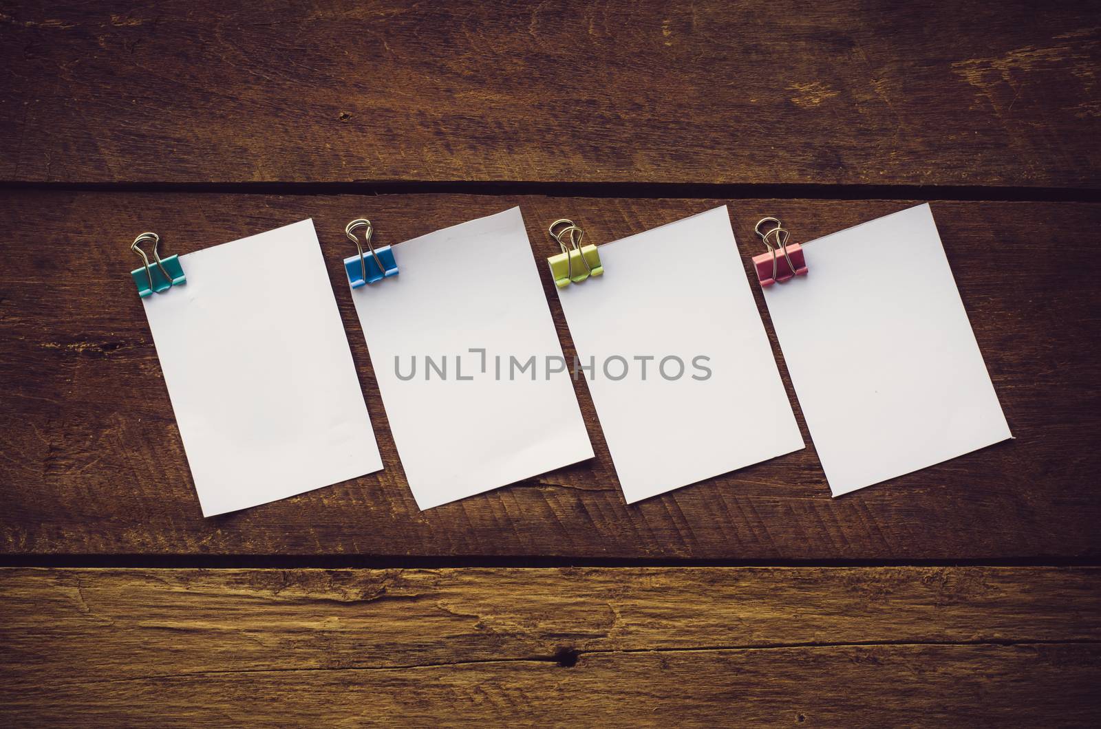 paper note on wooden background