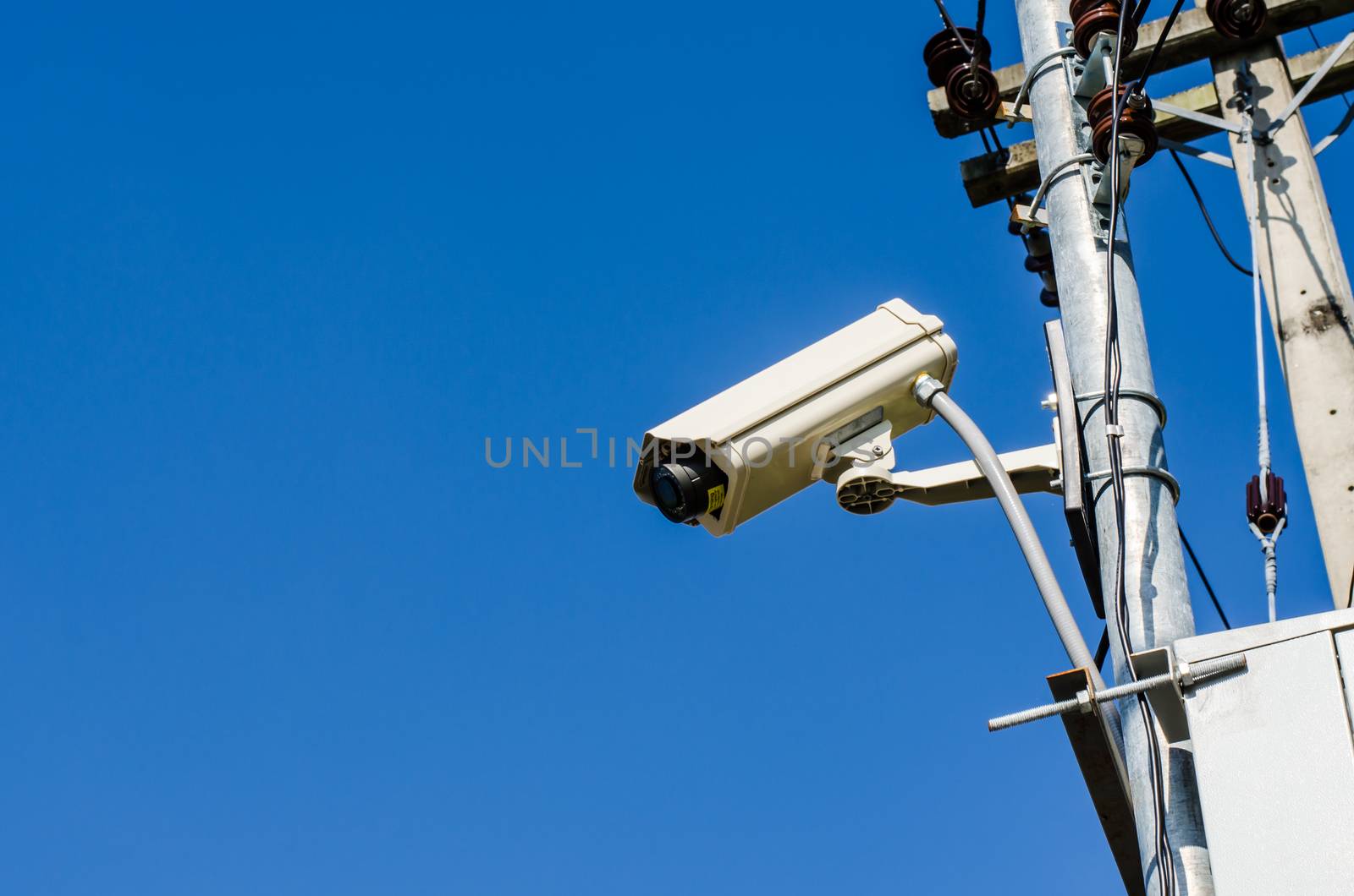 CCTV on blue sky background by photobyphotoboy