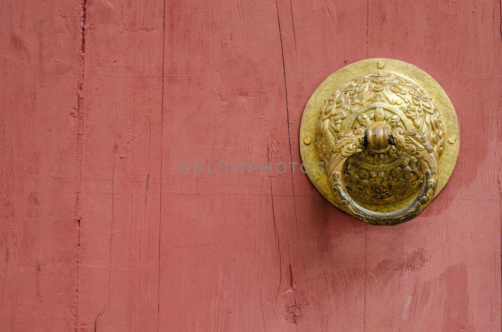 Chinese red door and knocker in gold to symbolize. by photobyphotoboy