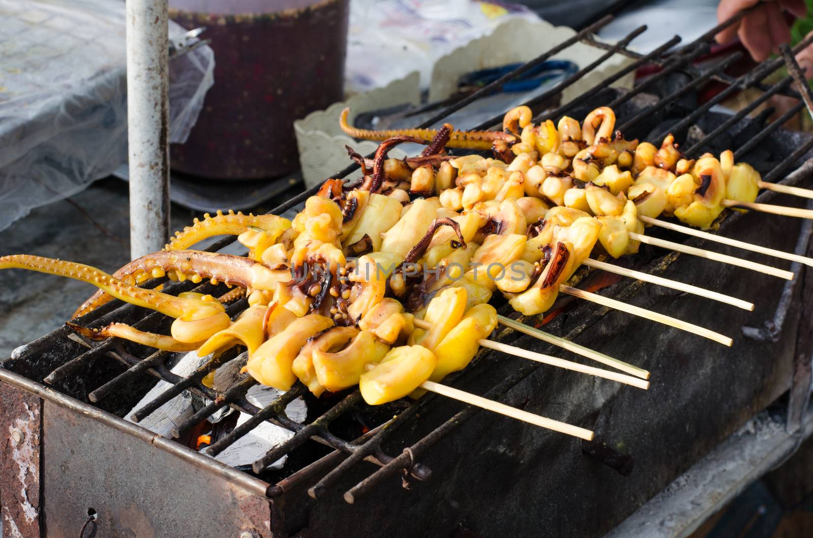 The squid grilled over charcoal fire