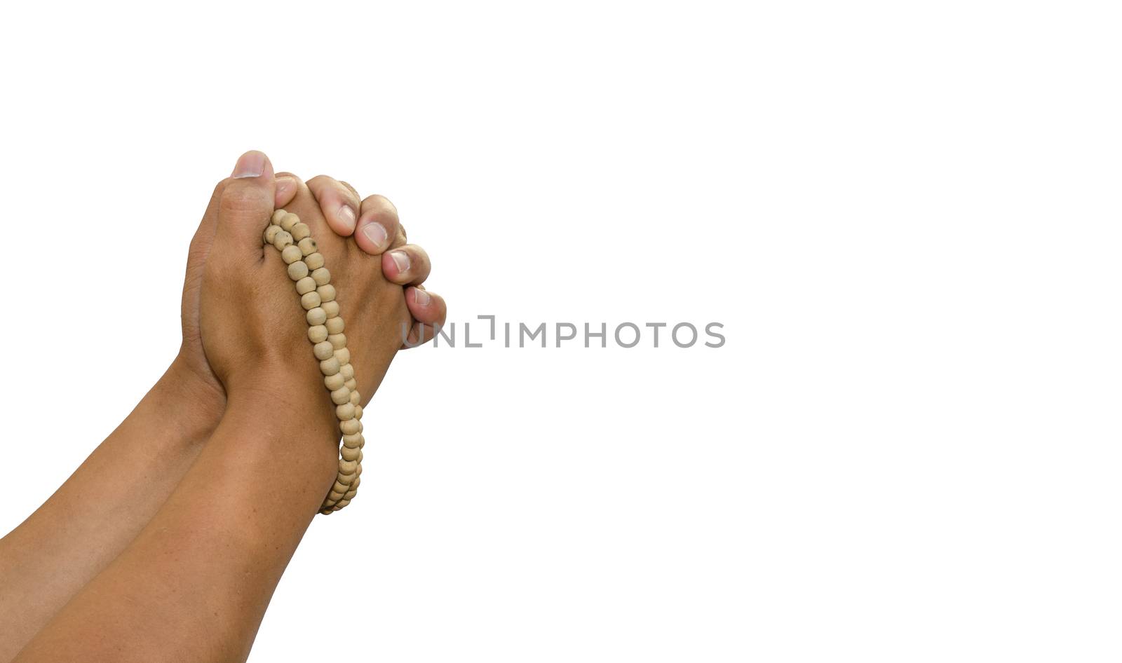 Praying the rosary in the hands of men on a white background.