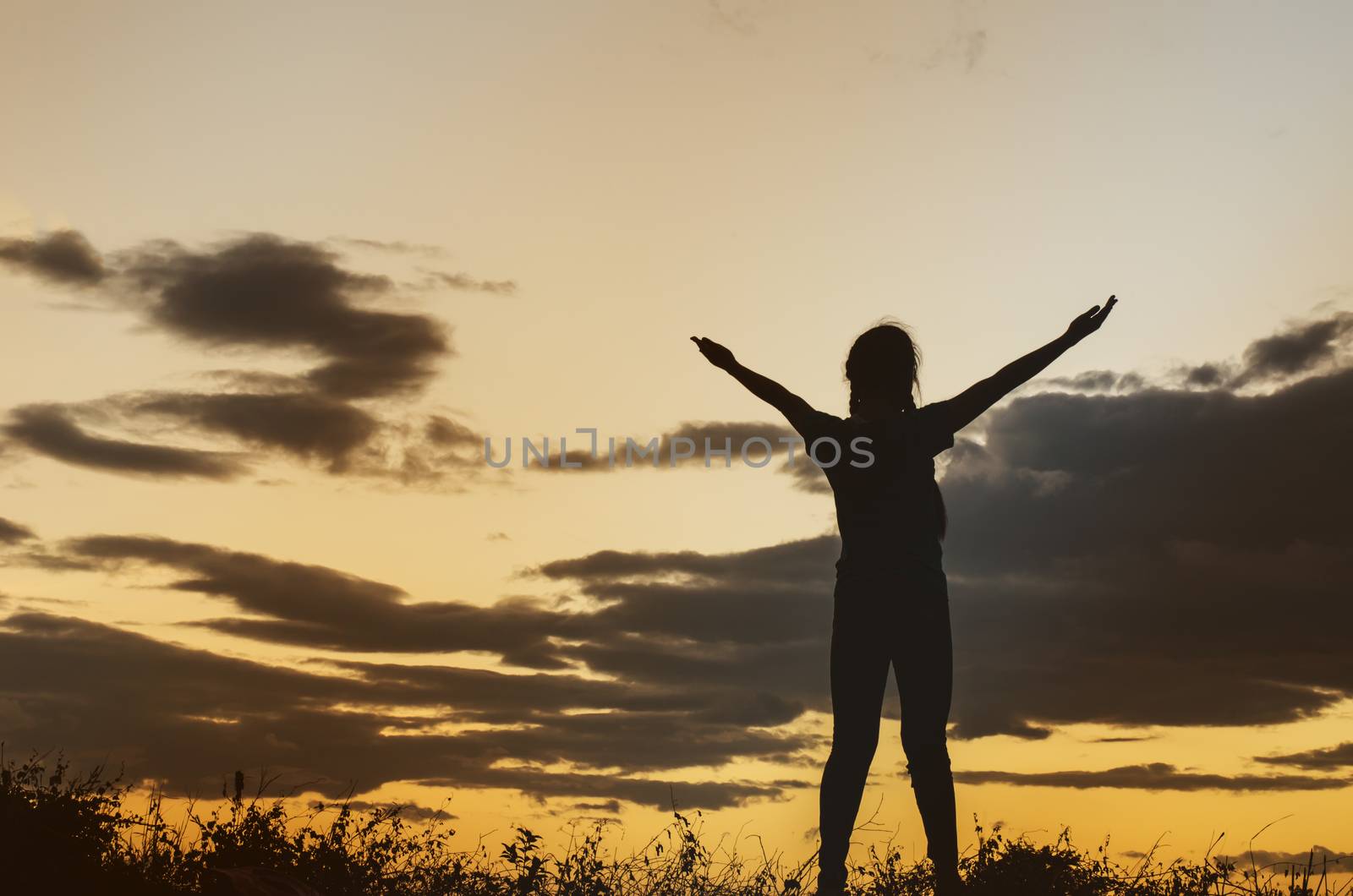 Shadow of a girl showing signs glad to see the sun, sky, nature