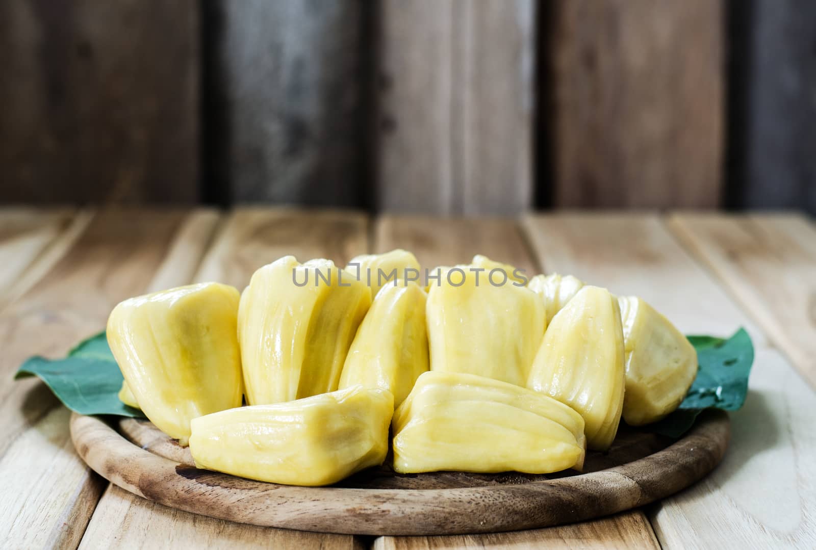 Thailand jackfruit, ripe fruit on wood background