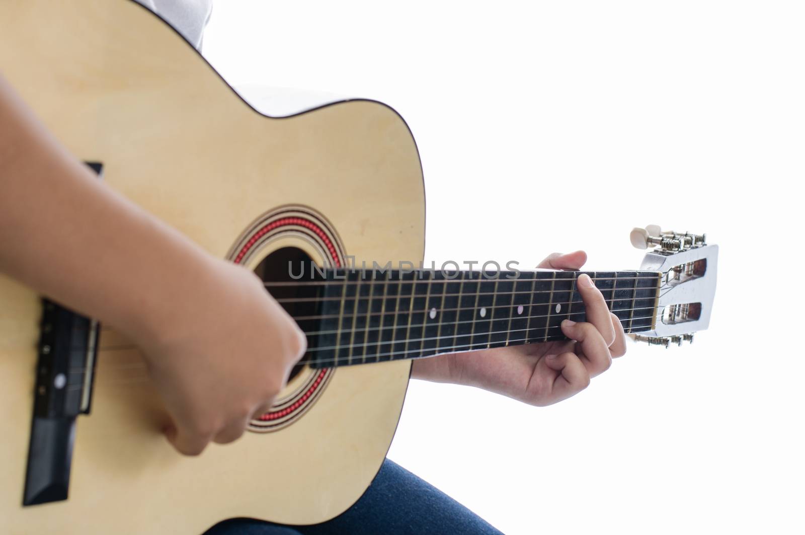 Girl playing guitar - Focus hand.
