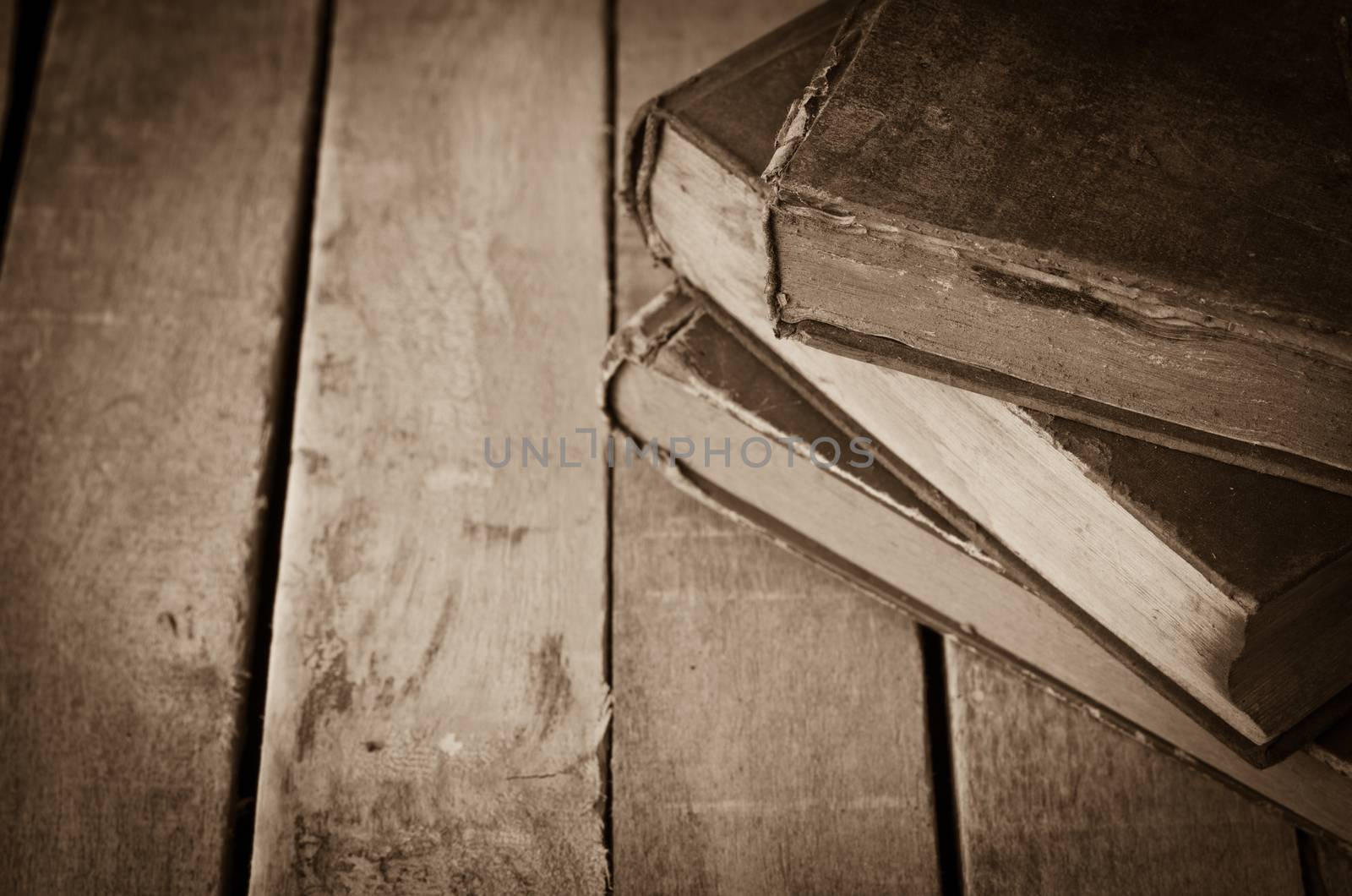 Old books on the wooden floor
