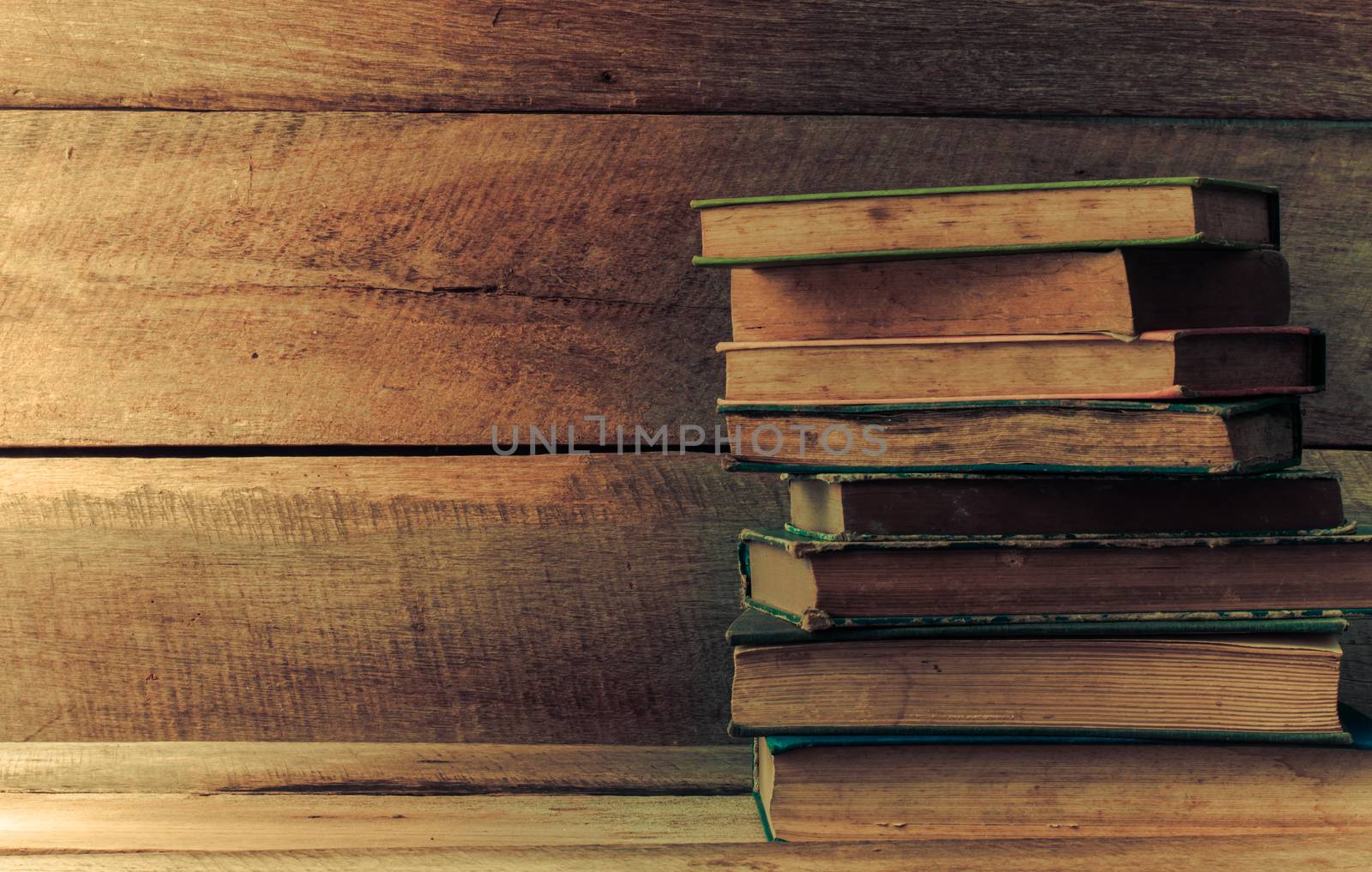 Old books on the wooden floor