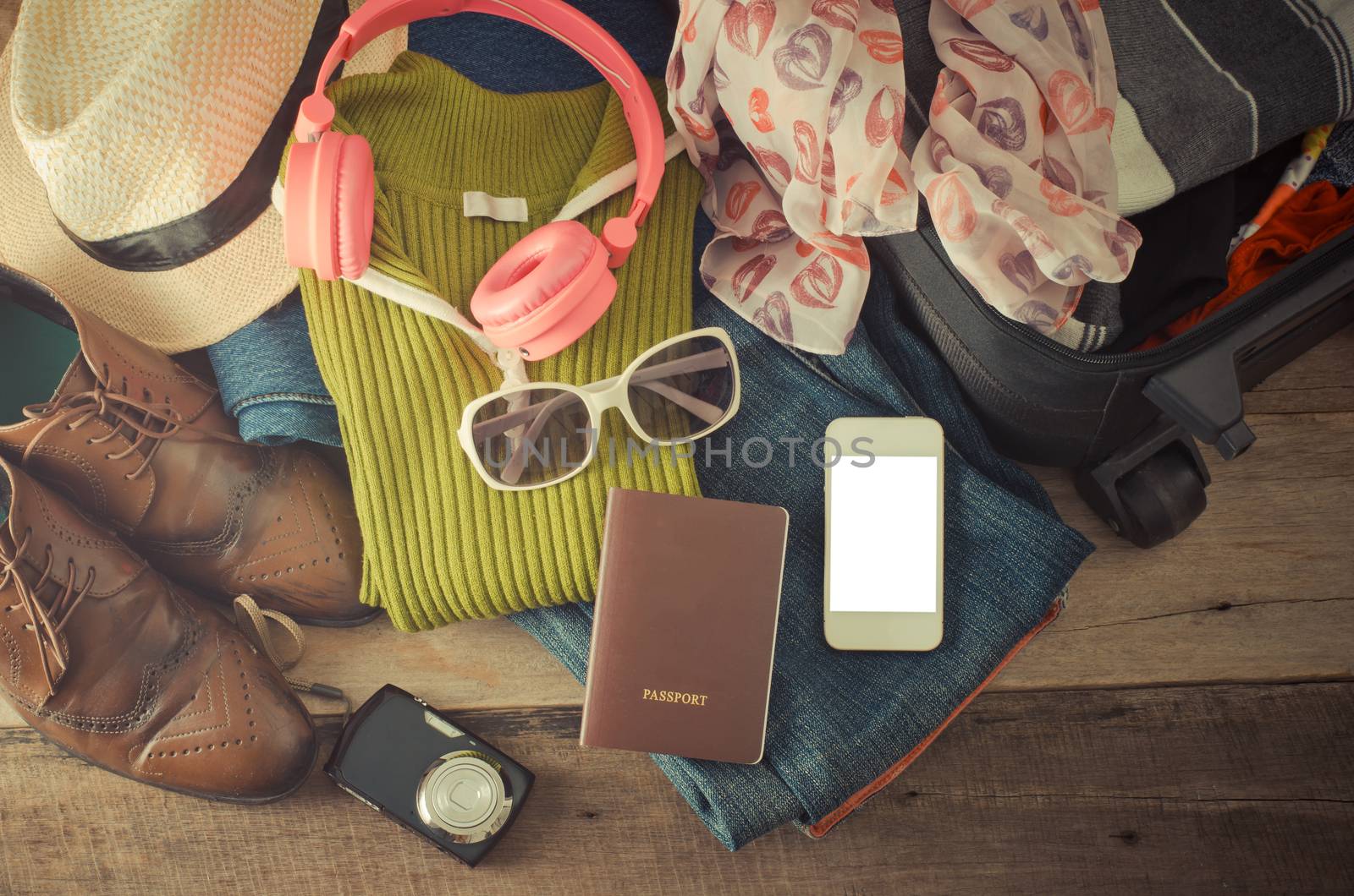 Travel accessories, clothes Wallet, glasses, phone headset. Passport, shoes. Ready for travel